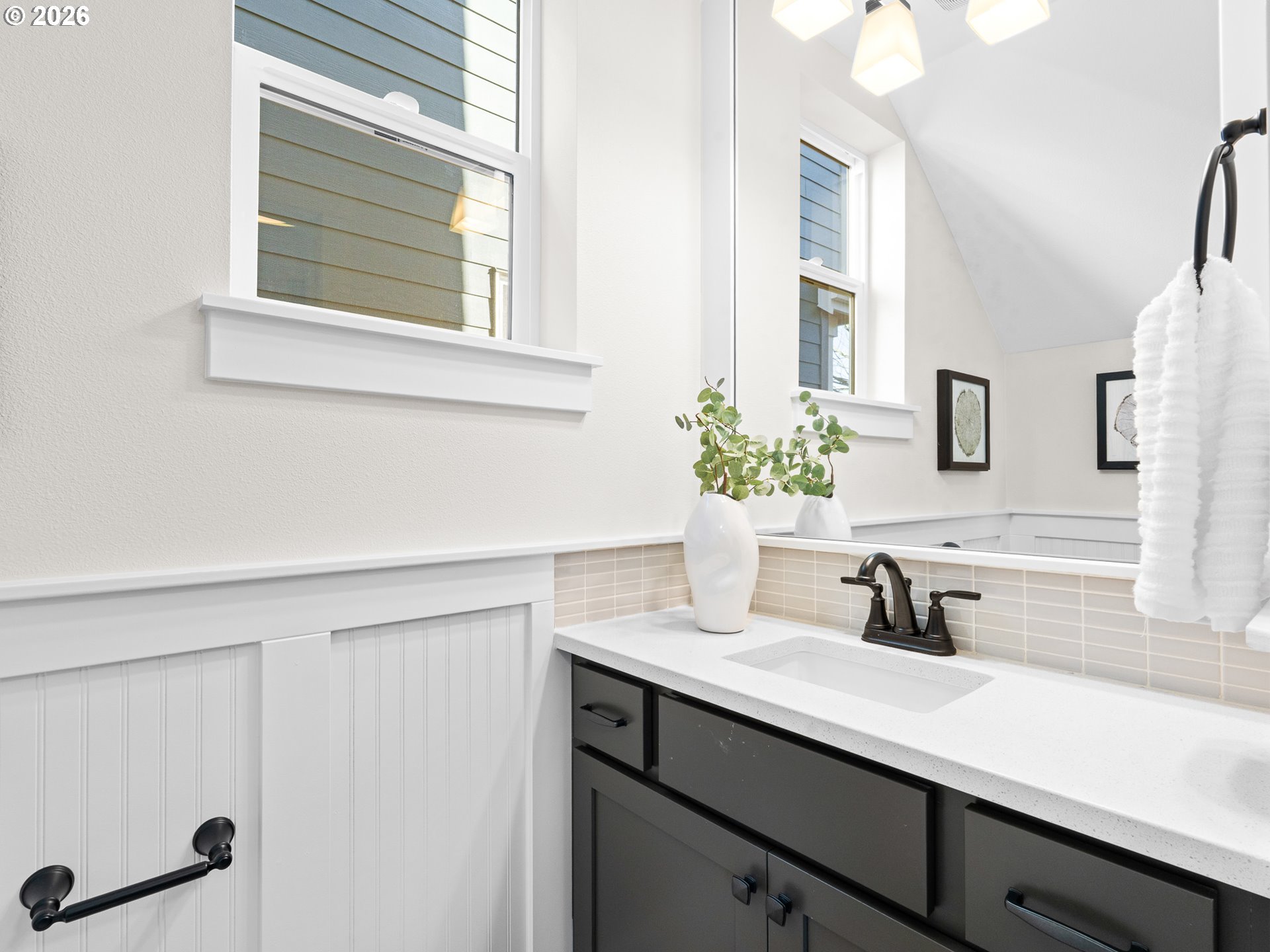 7460 North Polk Avenue Portland, OR 97203 - Photo 10 of 25 a bathroom with a sink and a mirror