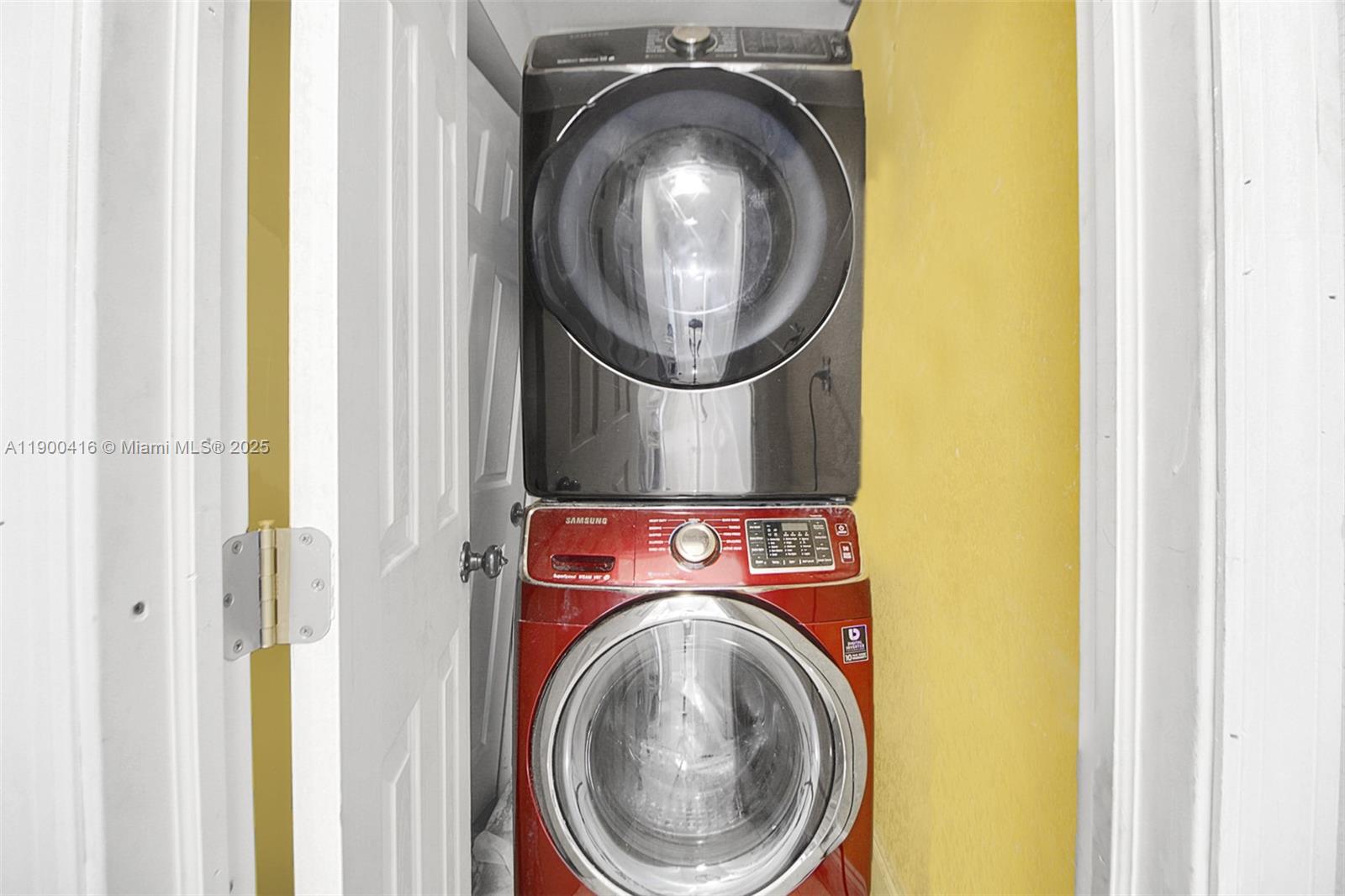 14880 Southwest 56th Terrace Miami, FL 33193 - Photo 20 of 35 a utility room with dryer and washer