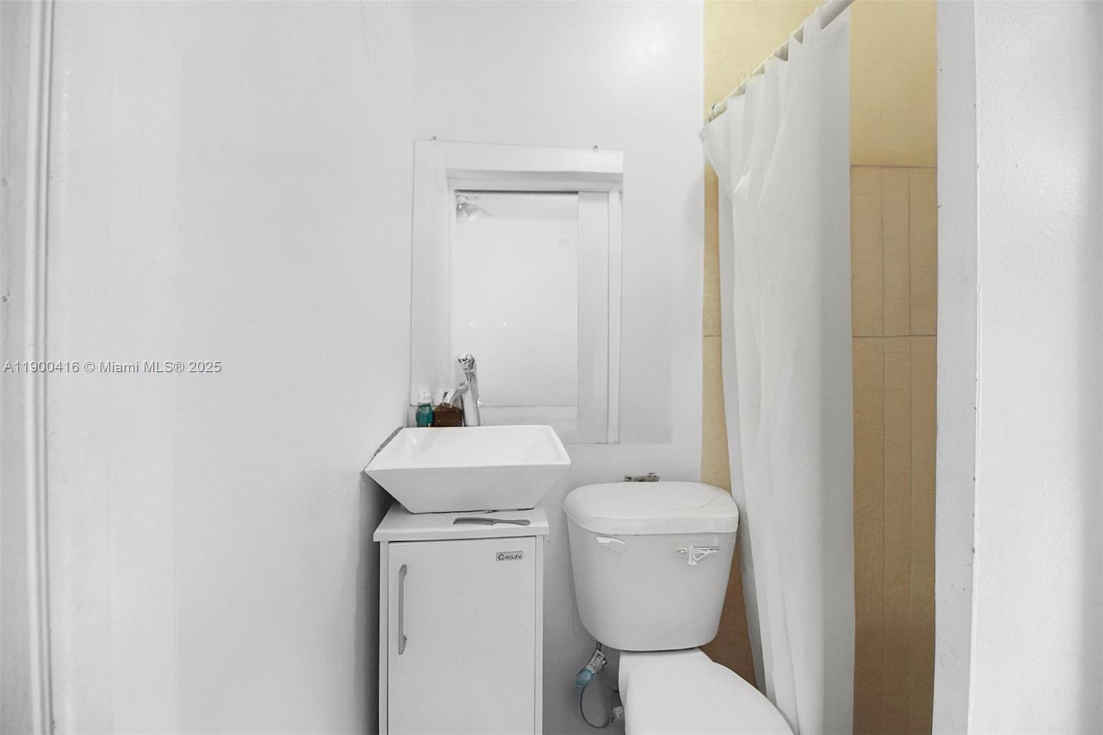 14880 Southwest 56th Terrace Miami, FL 33193 - Photo 8 of 35 a bathroom with a toilet and a sink