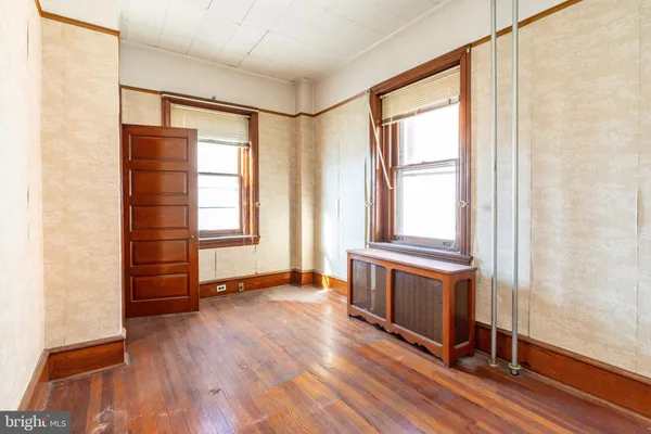 an empty room with windows