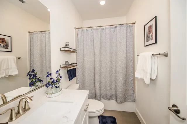 a bedroom with a bed and a closet