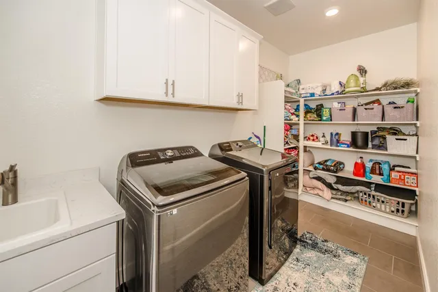 a bathroom with a sink toilet and a shower