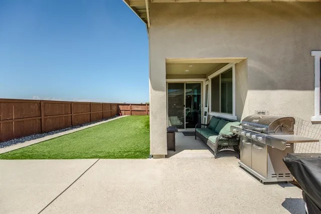 a table and chairs in the patio