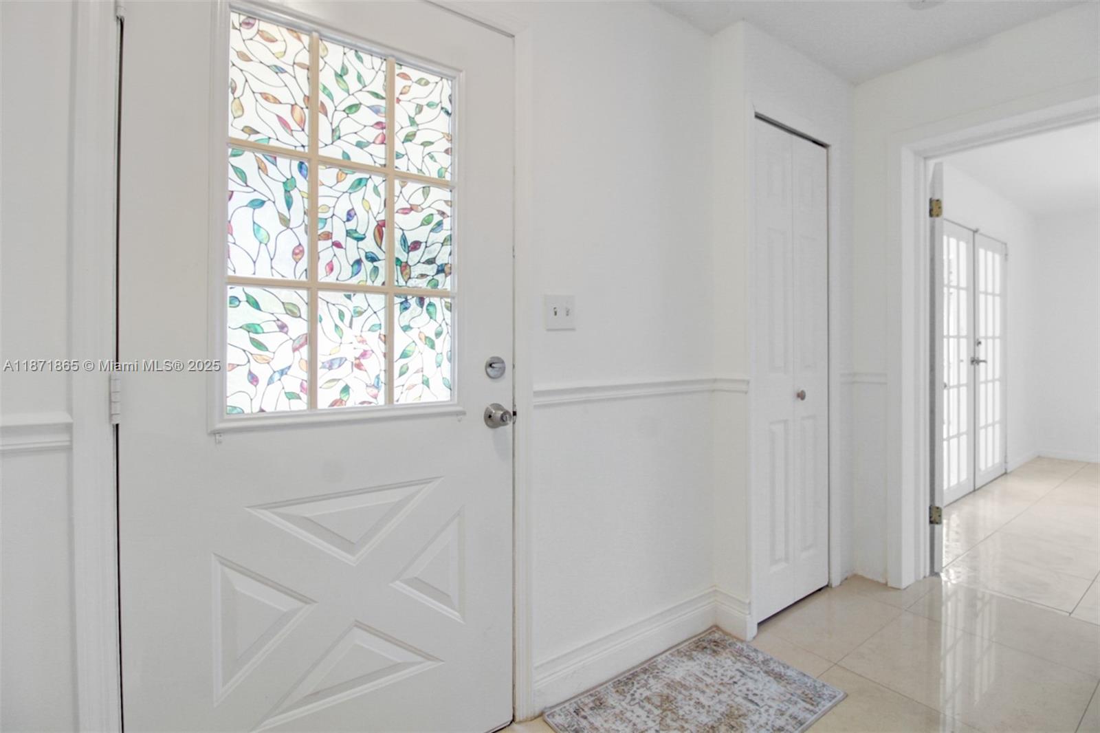 9930 Southwest 48th Street Miami, FL 33165 - Photo 20 of 29 a view of an entryway with wooden floor