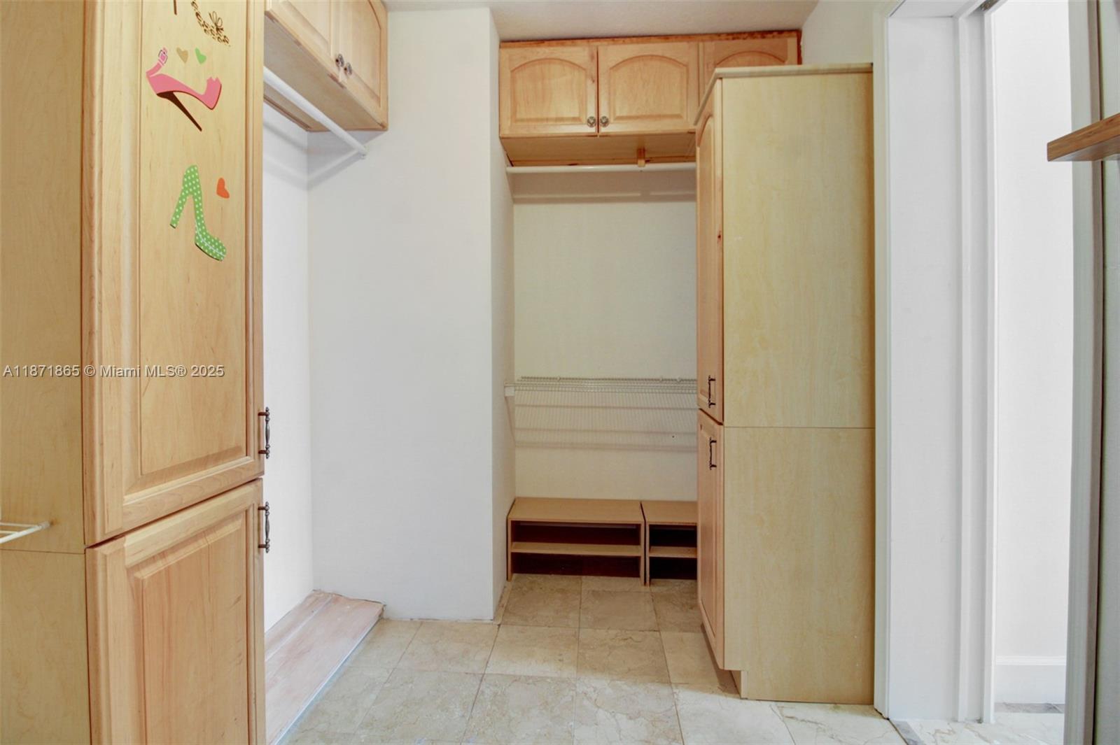 9930 Southwest 48th Street Miami, FL 33165 - Photo 27 of 29 a view of walk in closet