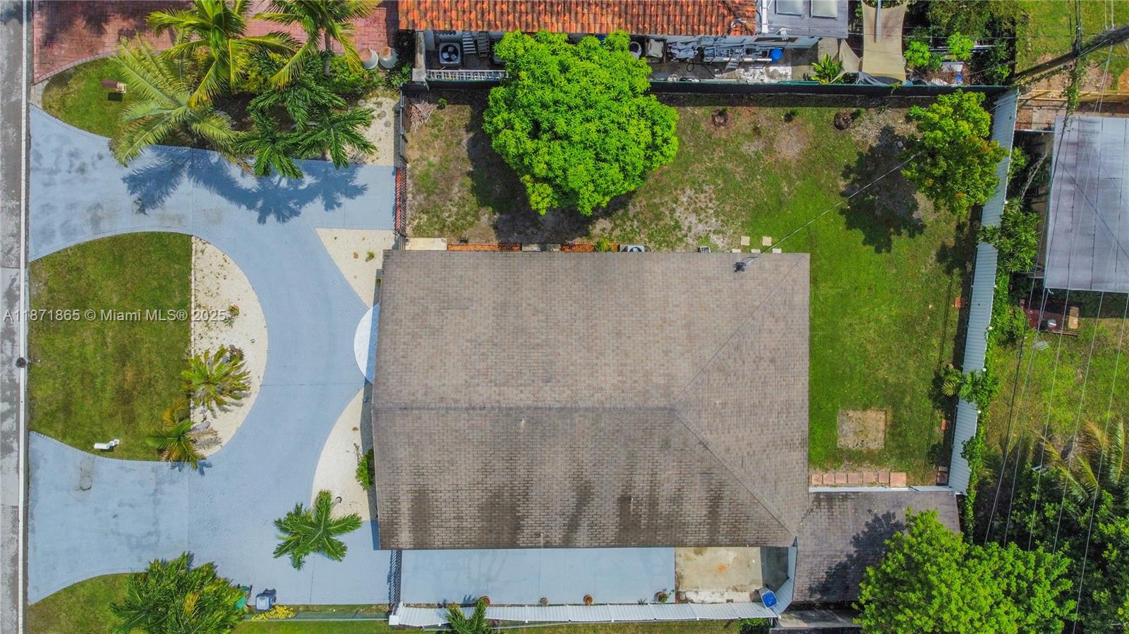 9930 Southwest 48th Street Miami, FL 33165 - Photo 4 of 29 an aerial view of a house with a swimming pool