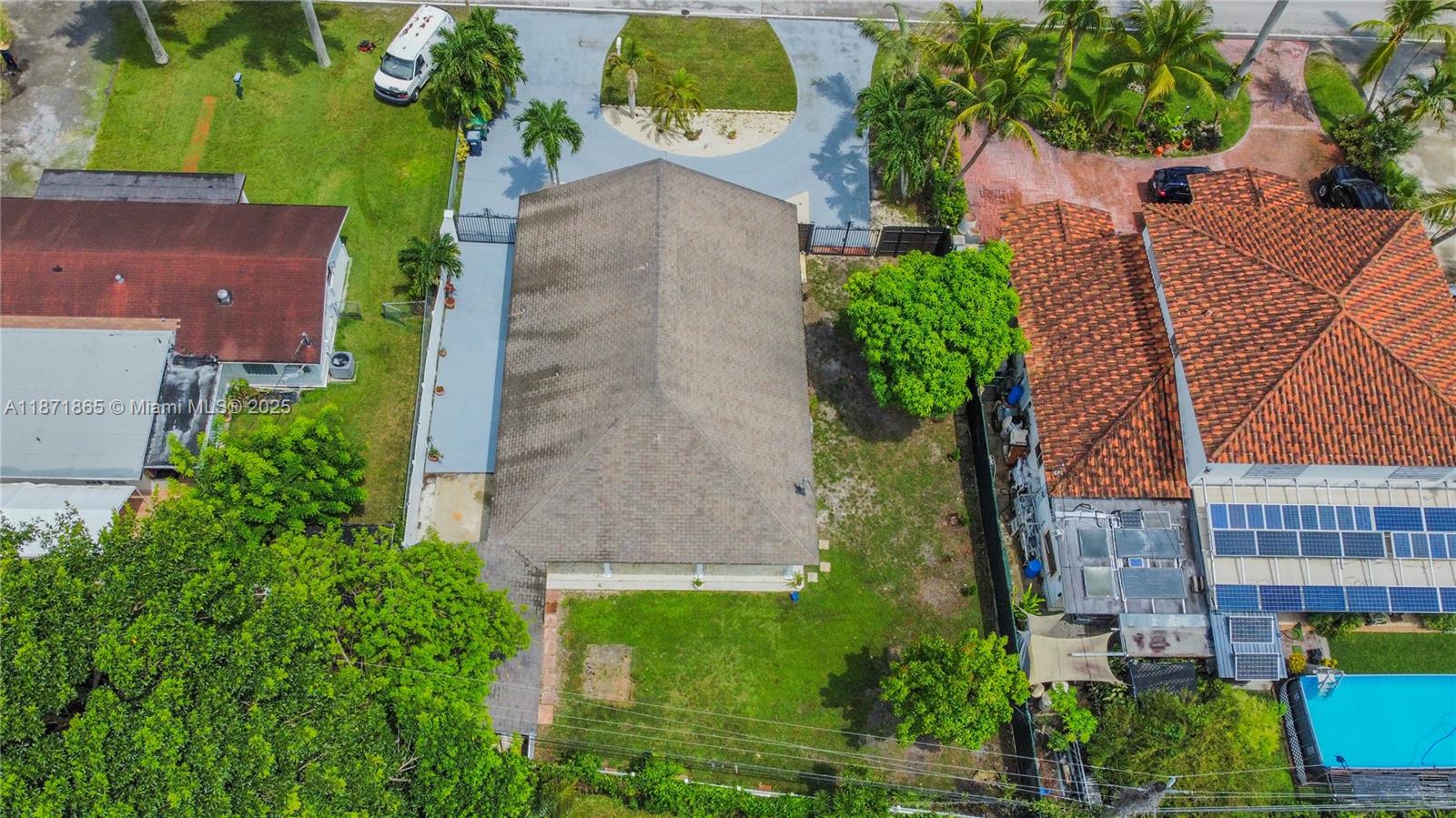 9930 Southwest 48th Street Miami, FL 33165 - Photo 5 of 29 an aerial view of a house with a yard
