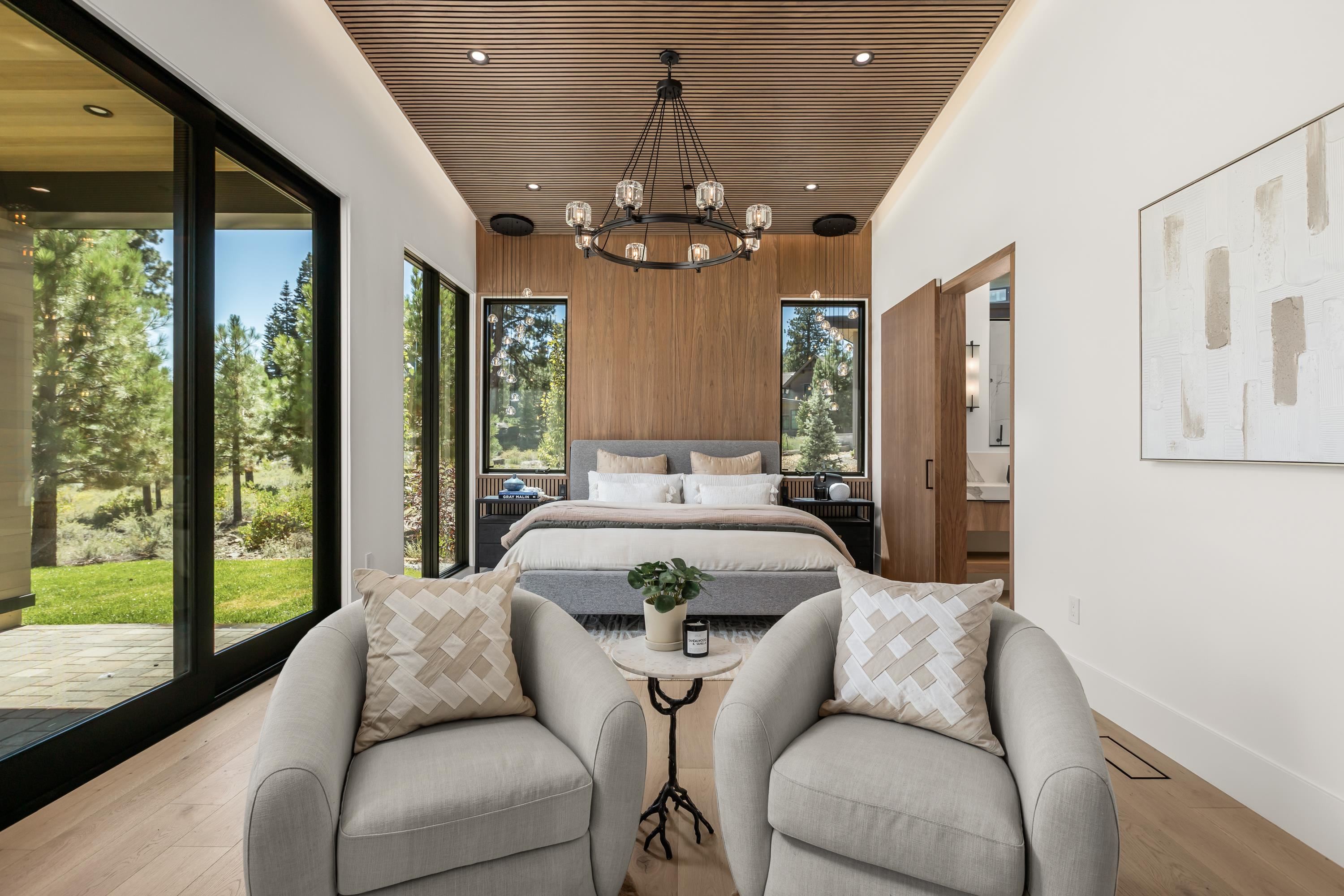 9308 Gaston Court Truckee, CA 96161 - Photo 11 of 28 a living room with furniture a chandelier and a chandelier