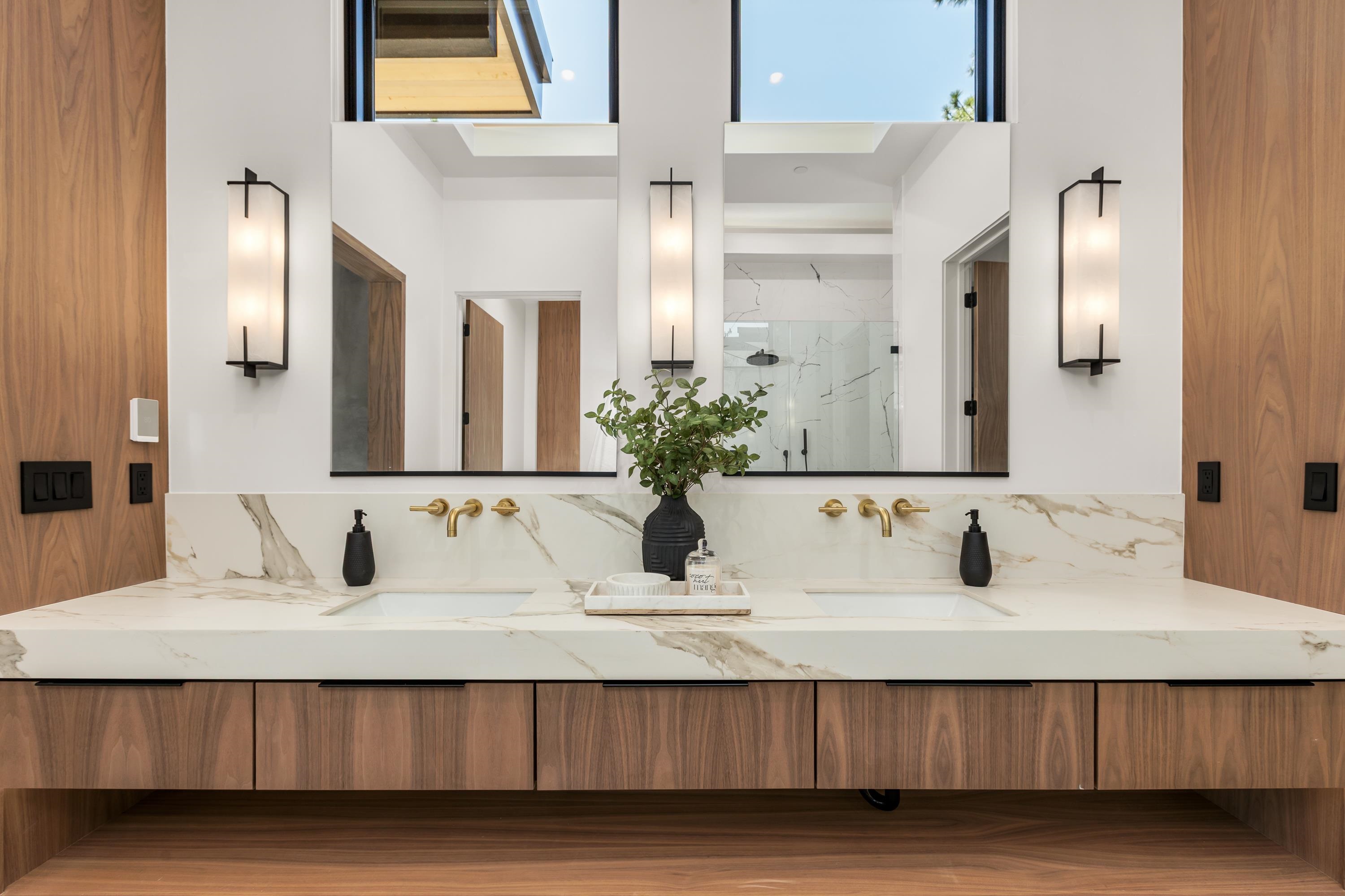 9308 Gaston Court Truckee, CA 96161 - Photo 13 of 28 a bathroom with a double vanity sink and a mirror