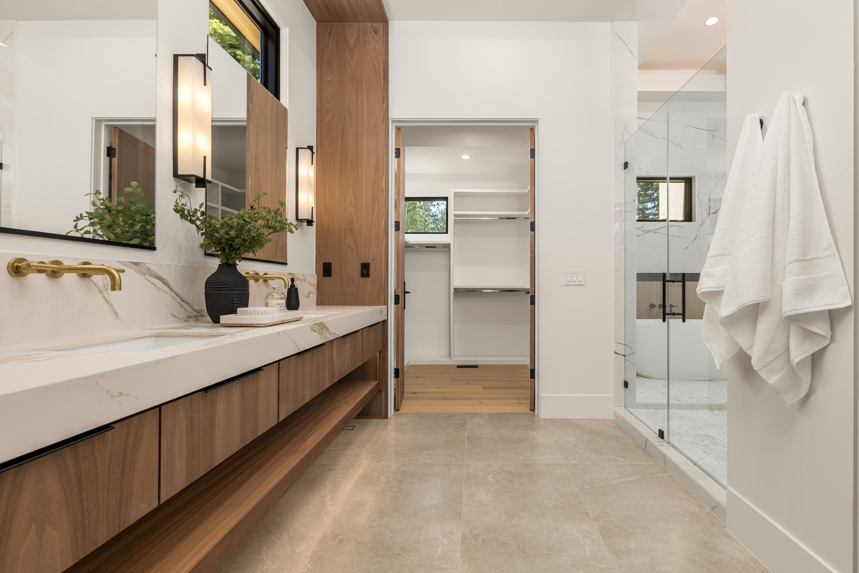 9308 Gaston Court Truckee, CA 96161 - Photo 14 of 28 a bathroom with a double vanity sink and mirror