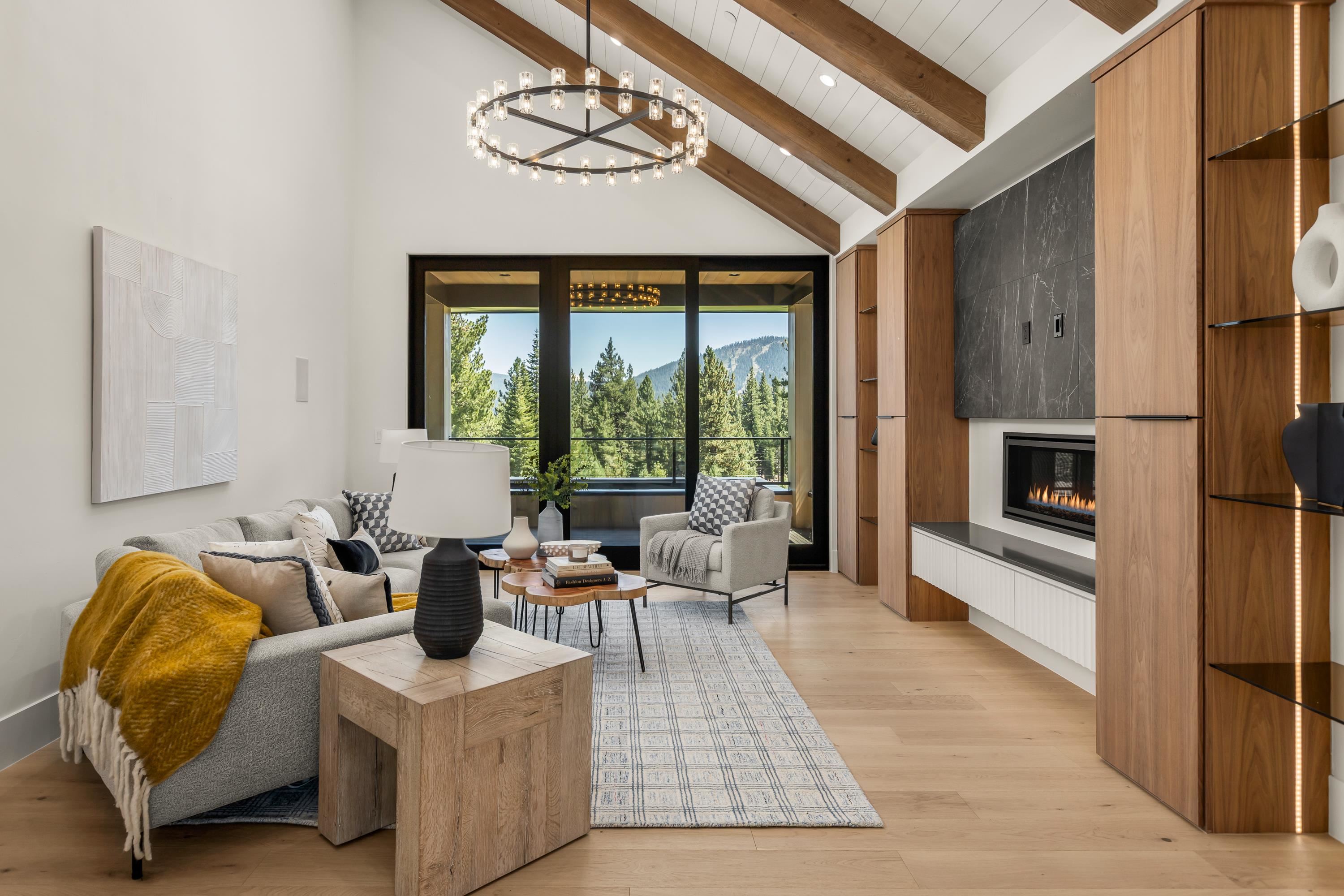 9308 Gaston Court Truckee, CA 96161 - Photo 15 of 28 a living room with furniture and a floor to ceiling window
