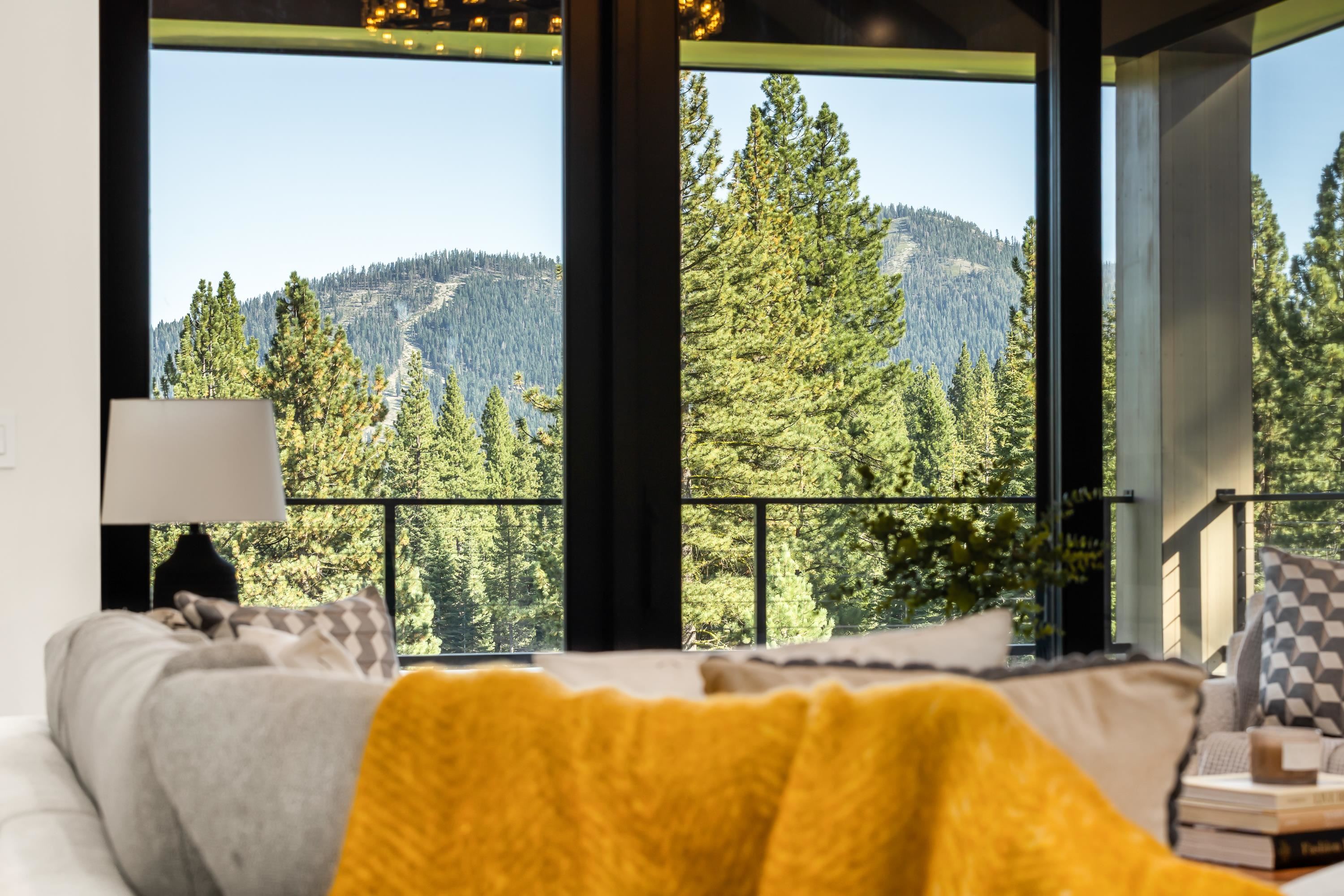 9308 Gaston Court Truckee, CA 96161 - Photo 16 of 28 a bedroom with bed and balcony