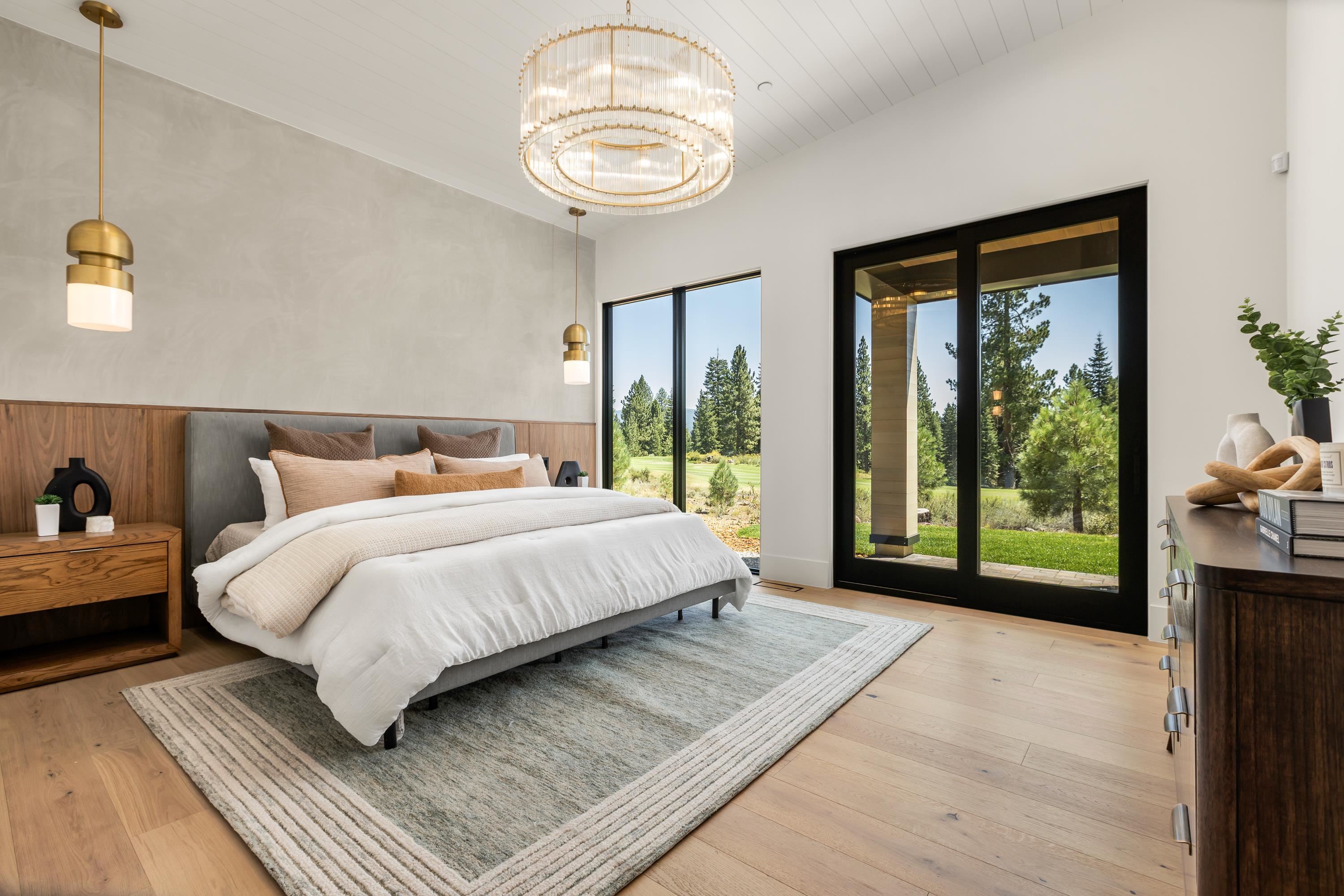 9308 Gaston Court Truckee, CA 96161 - Photo 17 of 28 a bedroom with a large bed and a large window