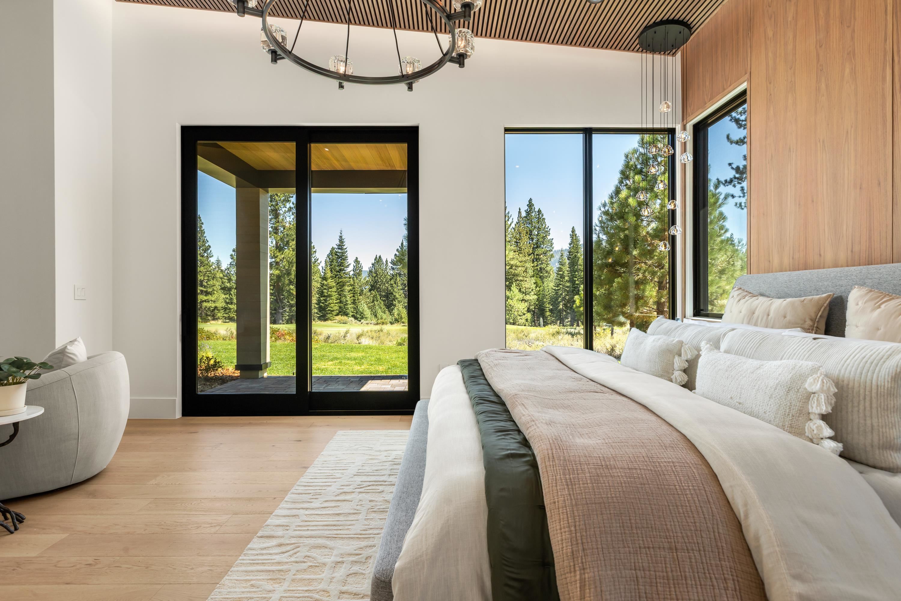 9308 Gaston Court Truckee, CA 96161 - Photo 18 of 28 a bedroom with a large bed and a large window