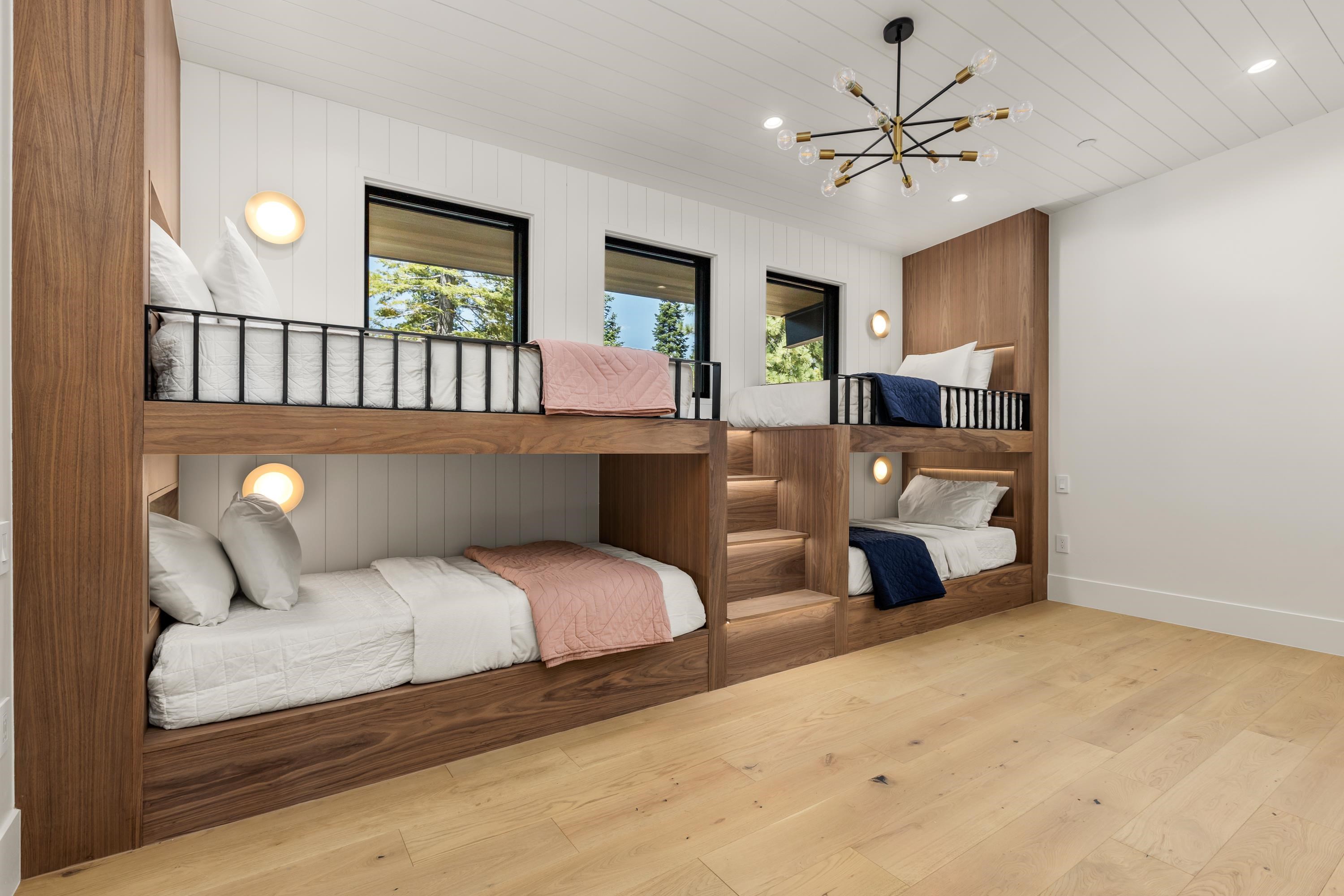 9308 Gaston Court Truckee, CA 96161 - Photo 20 of 28 a bedroom with a bed window and a ceiling fan