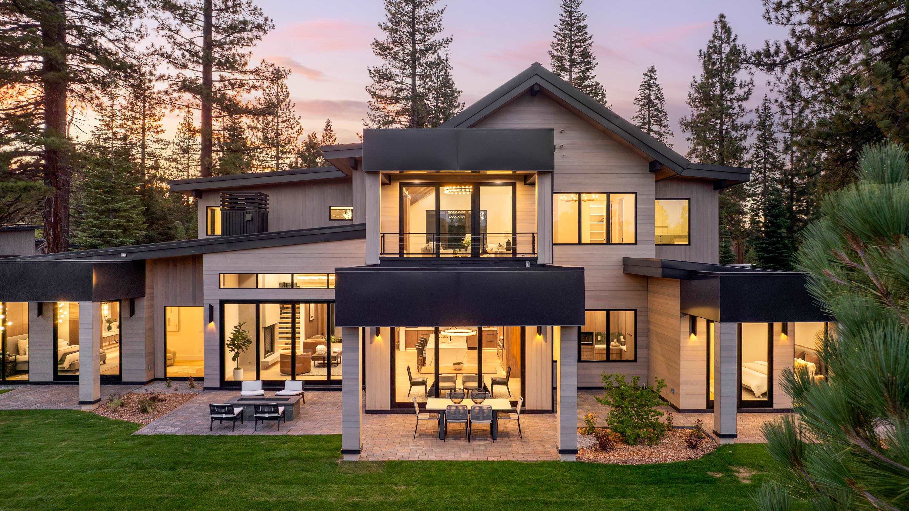 9308 Gaston Court Truckee, CA 96161 - Photo 2 of 28 a view of a patio with couches table and chairs and potted plants