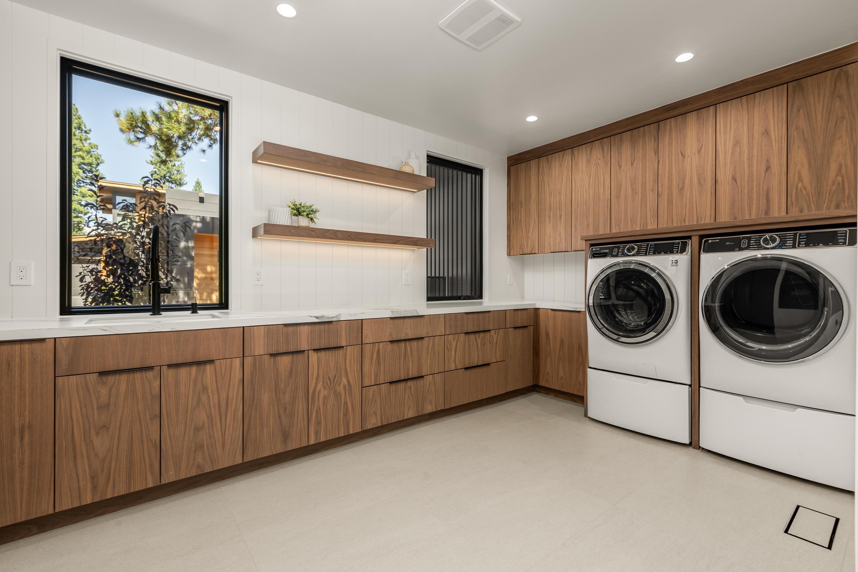 9308 Gaston Court Truckee, CA 96161 - Photo 22 of 28 a utility room with sink dryer and washer