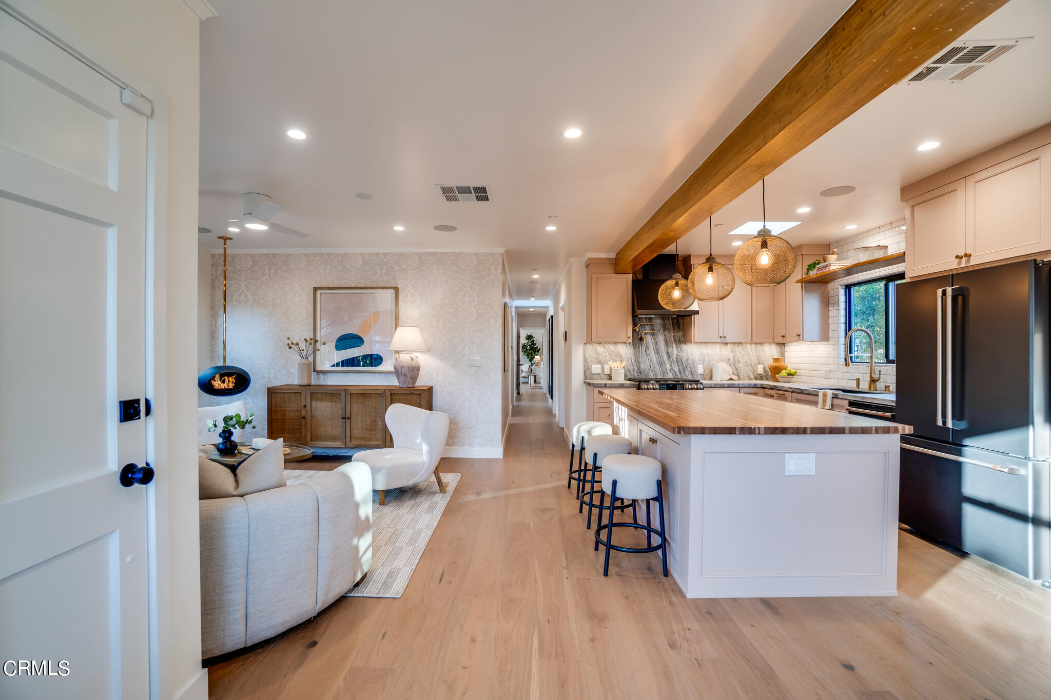 2425 Cooley Place Pasadena, CA 91104 - Photo 15 of 74 a large kitchen with stainless steel appliances kitchen island granite countertop a large island in the center