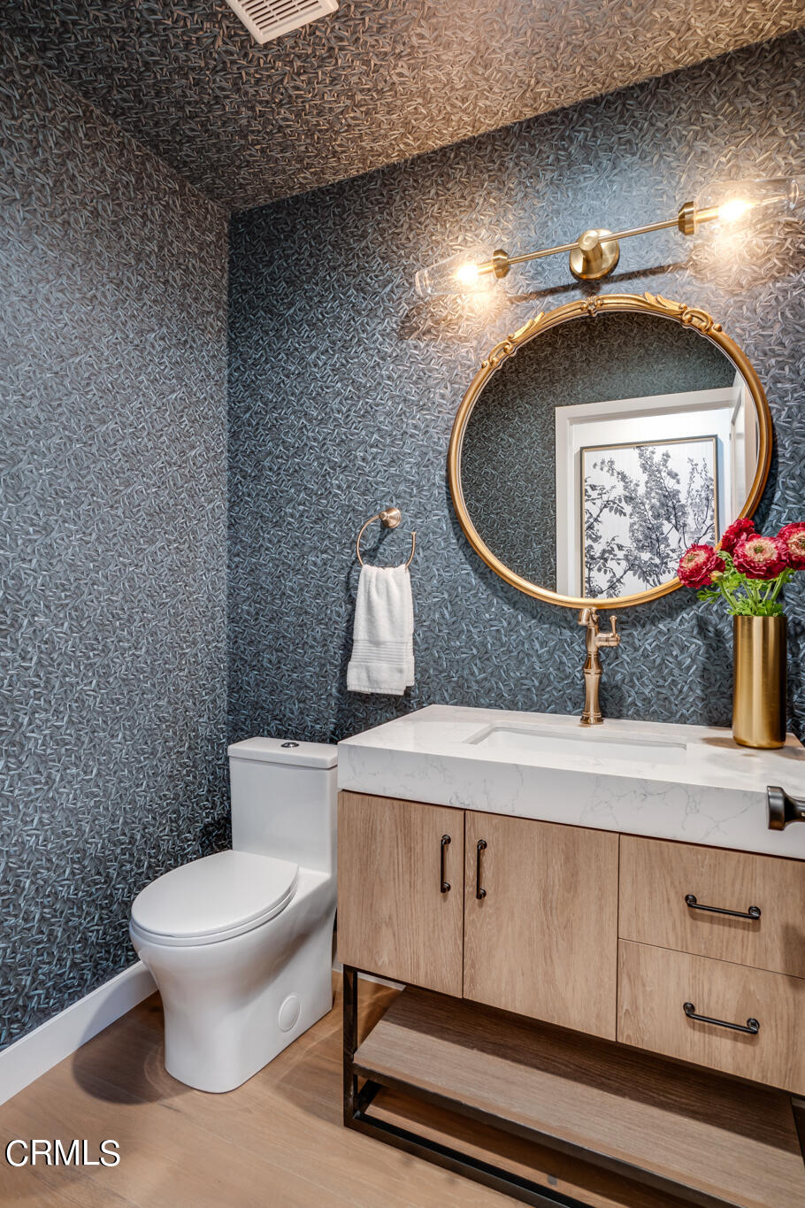 2425 Cooley Place Pasadena, CA 91104 - Photo 35 of 74 a bathroom with a toilet and a sink