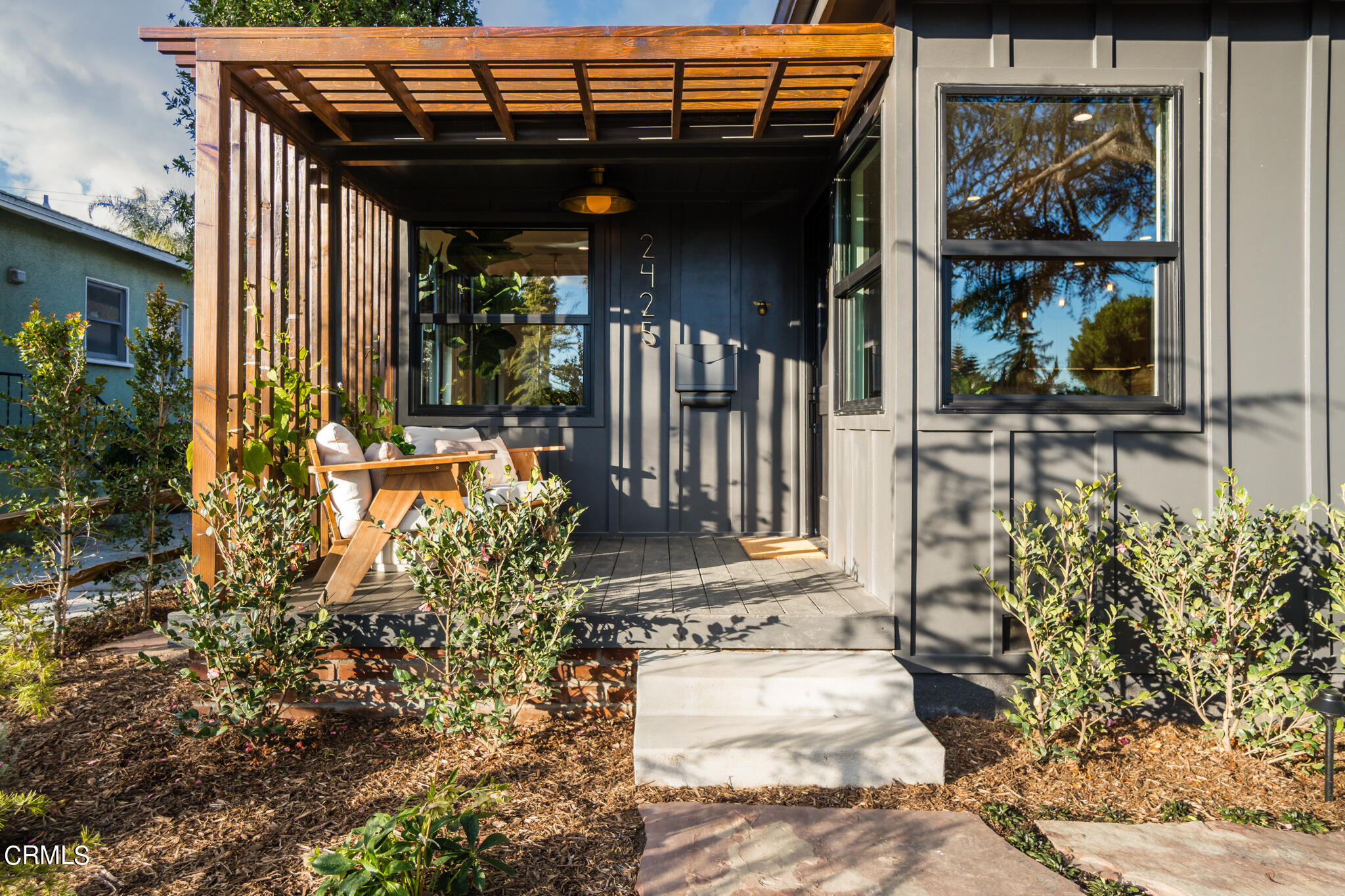 2425 Cooley Place Pasadena, CA 91104 - Photo 4 of 74 a view of a porch with potted plants