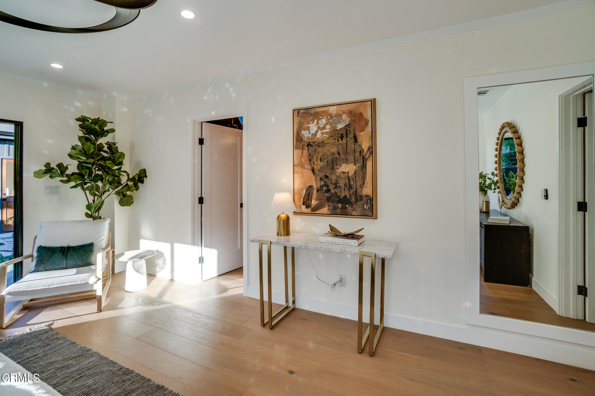 2425 Cooley Place Pasadena, CA 91104 - Photo 47 of 74 a living room with furniture a potted plant and a fireplace