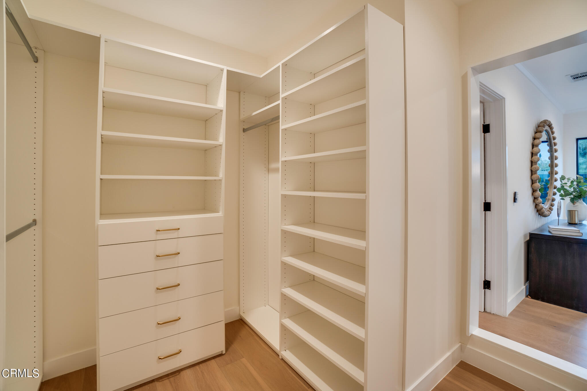2425 Cooley Place Pasadena, CA 91104 - Photo 49 of 74 a view of walk in closet with empty racks