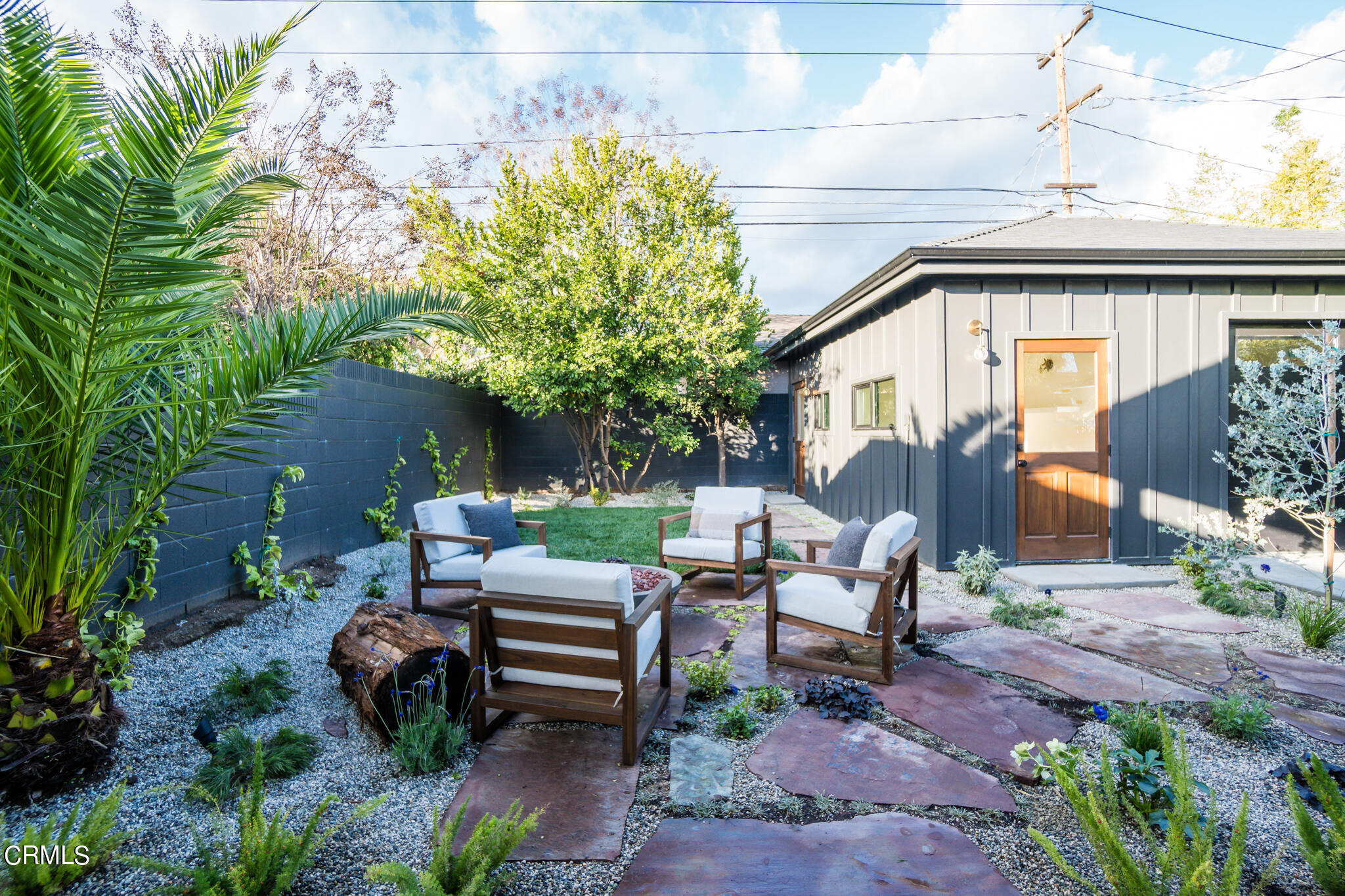 2425 Cooley Place Pasadena, CA 91104 - Photo 53 of 74 a view of a patio with chairs and potted plants