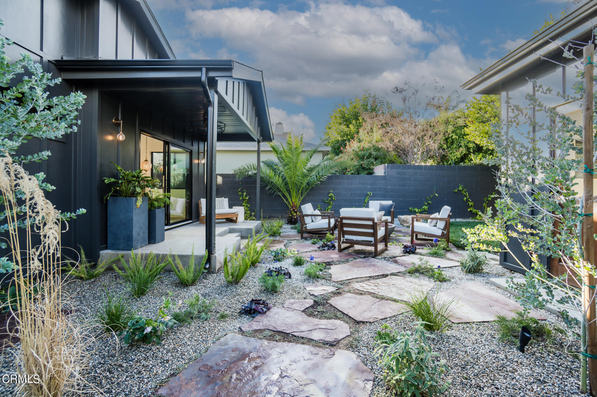 2425 Cooley Place Pasadena, CA 91104 - Photo 59 of 74 a view of backyard with plants and outdoor seating