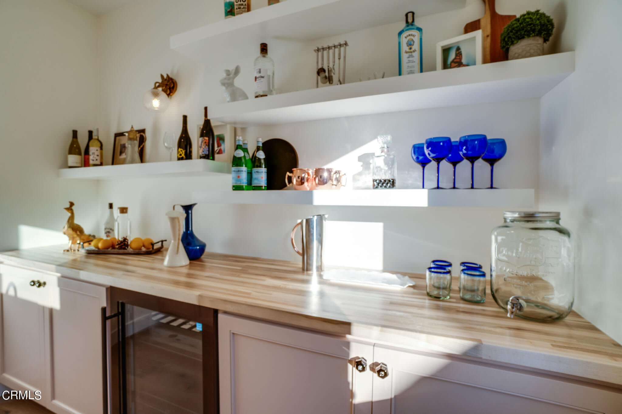 2425 Cooley Place Pasadena, CA 91104 - Photo 61 of 74 a kitchen with kitchen island a sink dishwasher and cabinets with wooden floor