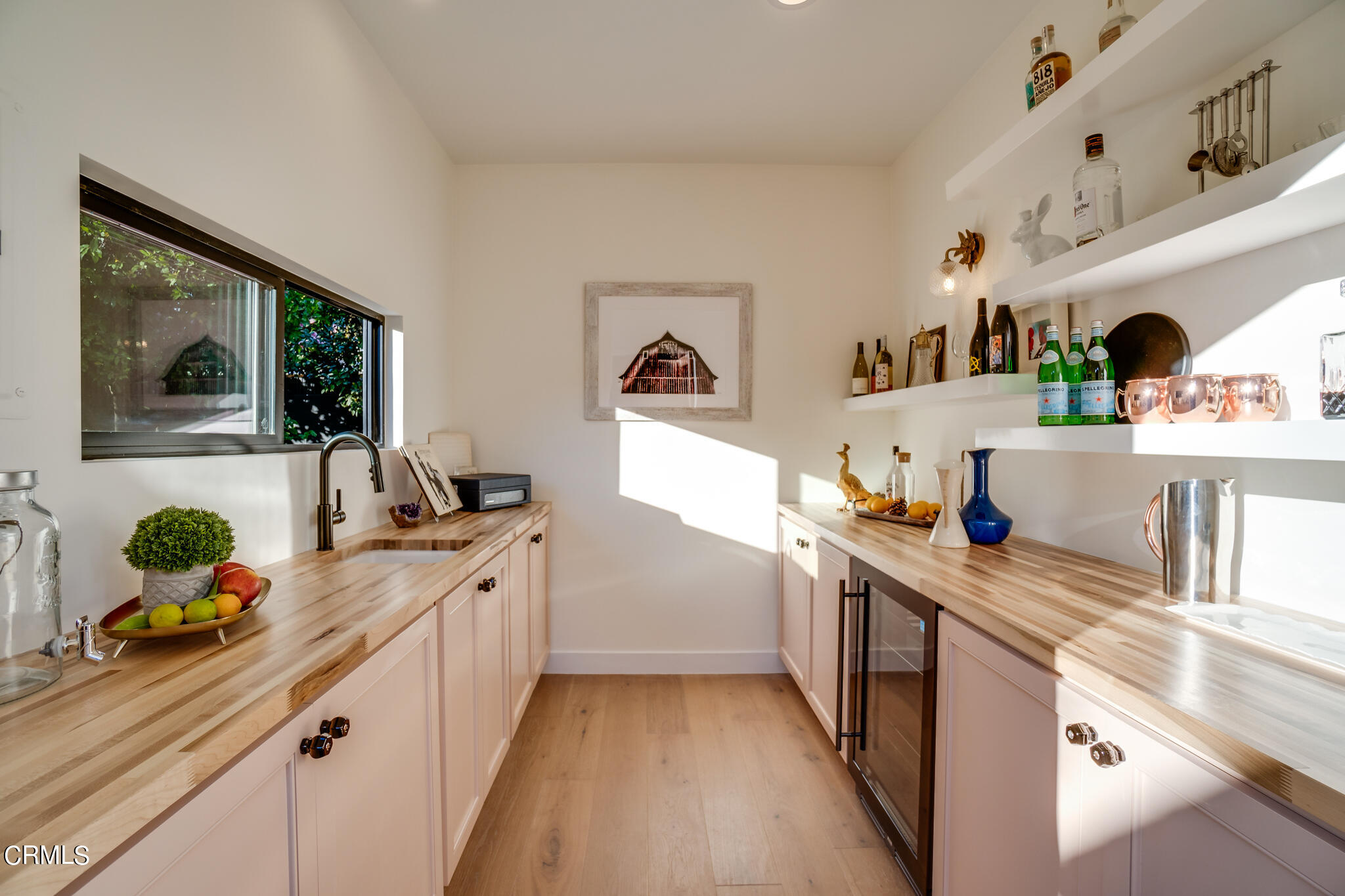 2425 Cooley Place Pasadena, CA 91104 - Photo 62 of 74 a kitchen with stainless steel appliances a sink and a refrigerator