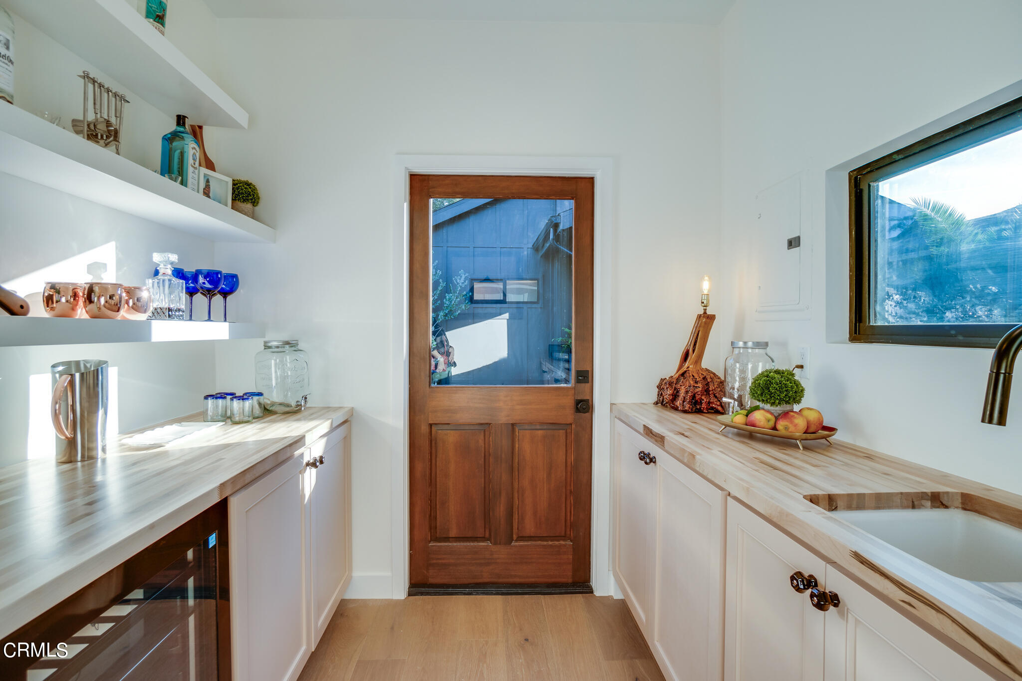 2425 Cooley Place Pasadena, CA 91104 - Photo 63 of 74 a kitchen with a sink cabinets and window