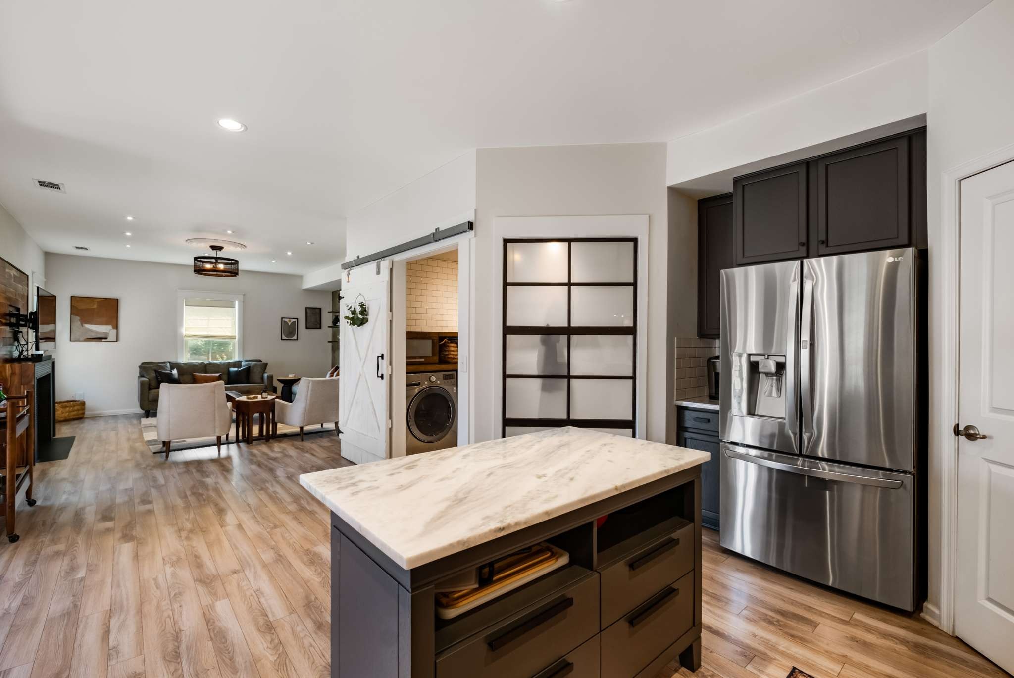 2000 Kingston Place Spring Hill, TN 37174 - Photo 13 of 56 a kitchen with stainless steel appliances a refrigerator and wooden floor
