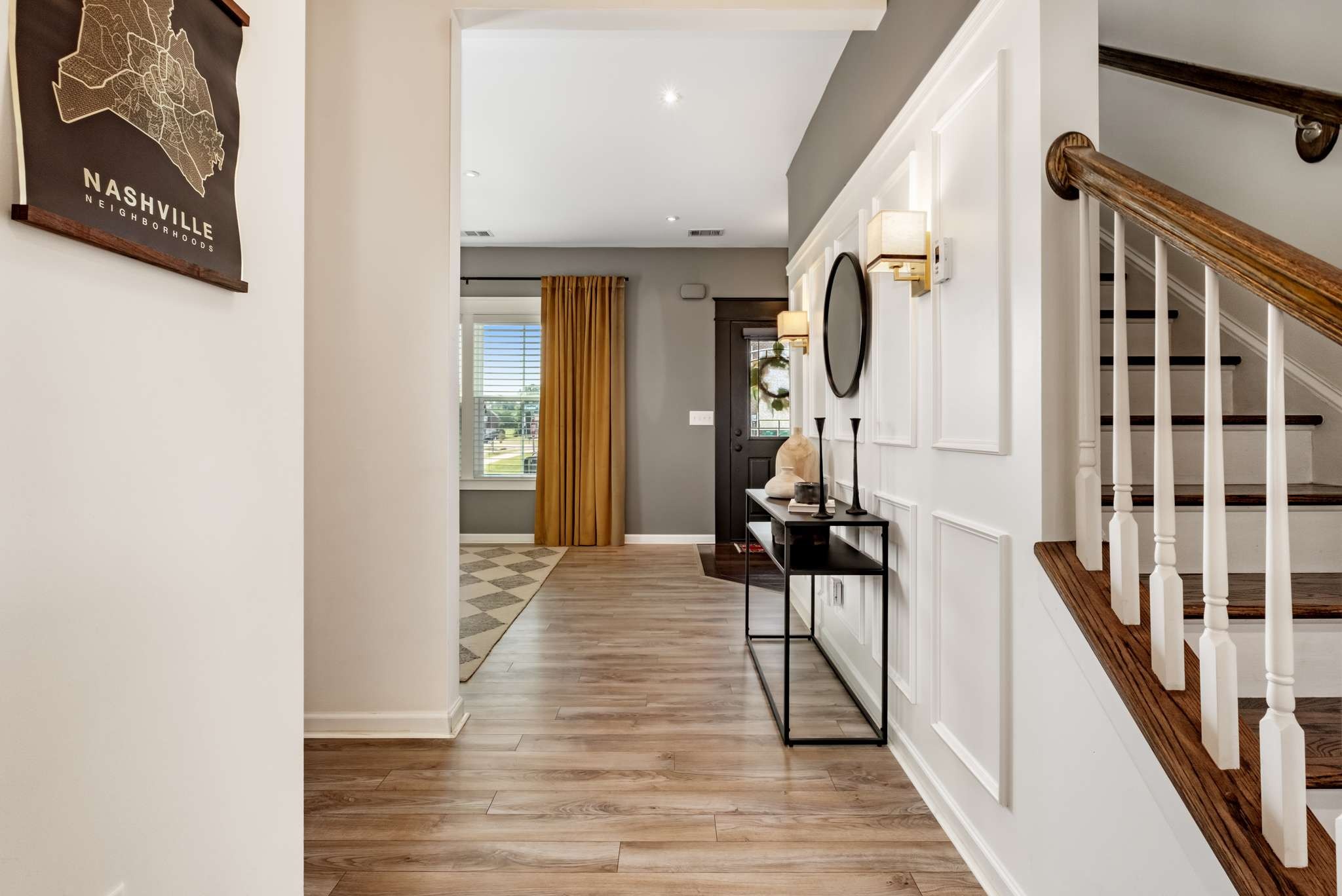 2000 Kingston Place Spring Hill, TN 37174 - Photo 23 of 56 a view of a hallway with wooden floor and staircase