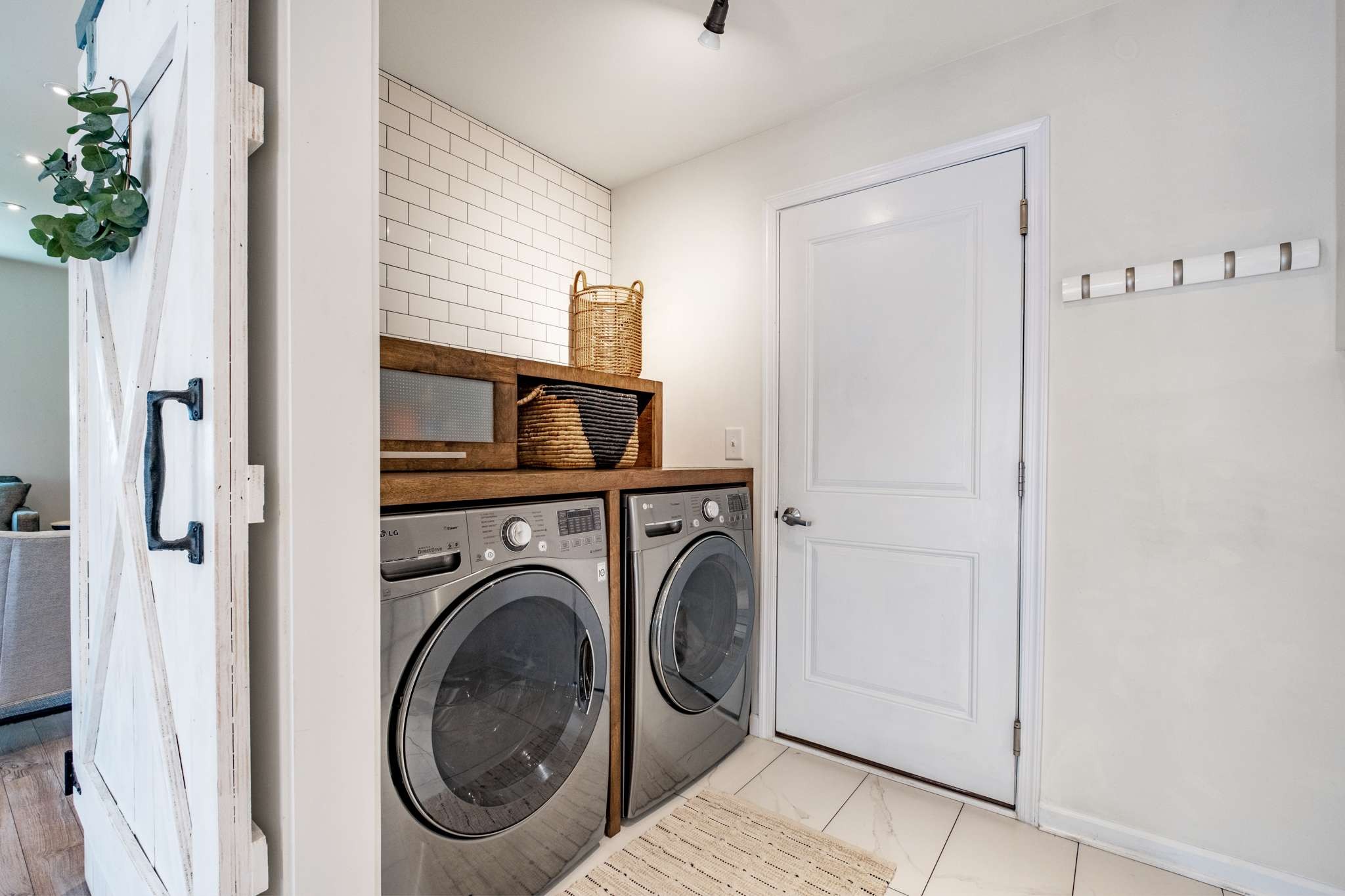 2000 Kingston Place Spring Hill, TN 37174 - Photo 26 of 56 a view of storage and utility room with washer and dryer