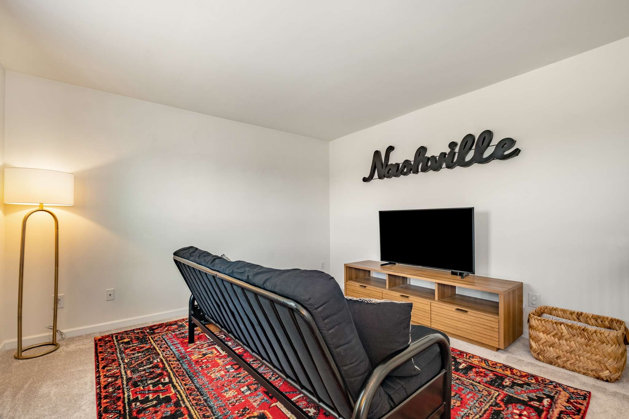 2000 Kingston Place Spring Hill, TN 37174 - Photo 30 of 56 a bedroom with furniture and a flat screen tv