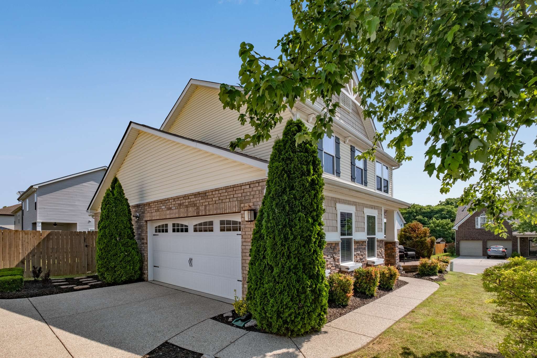 2000 Kingston Place Spring Hill, TN 37174 - Photo 40 of 56 front view of a house with a tree