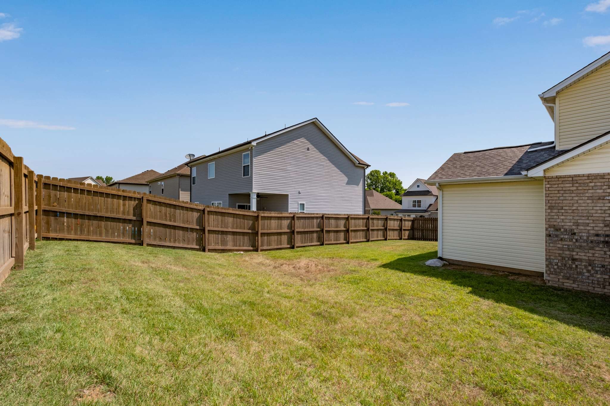 2000 Kingston Place Spring Hill, TN 37174 - Photo 45 of 56 a view of a house with wooden fence