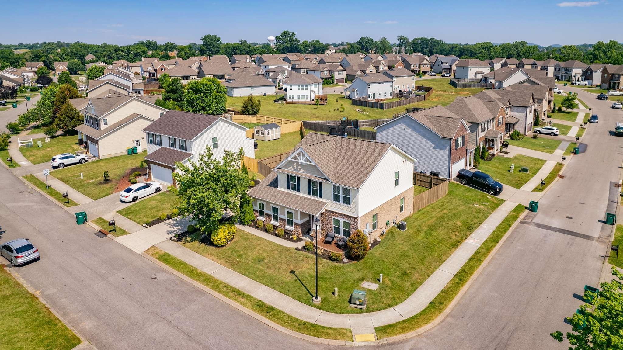 2000 Kingston Place Spring Hill, TN 37174 - Photo 47 of 56 an aerial view of a house with a swimming pool outdoor seating and yard