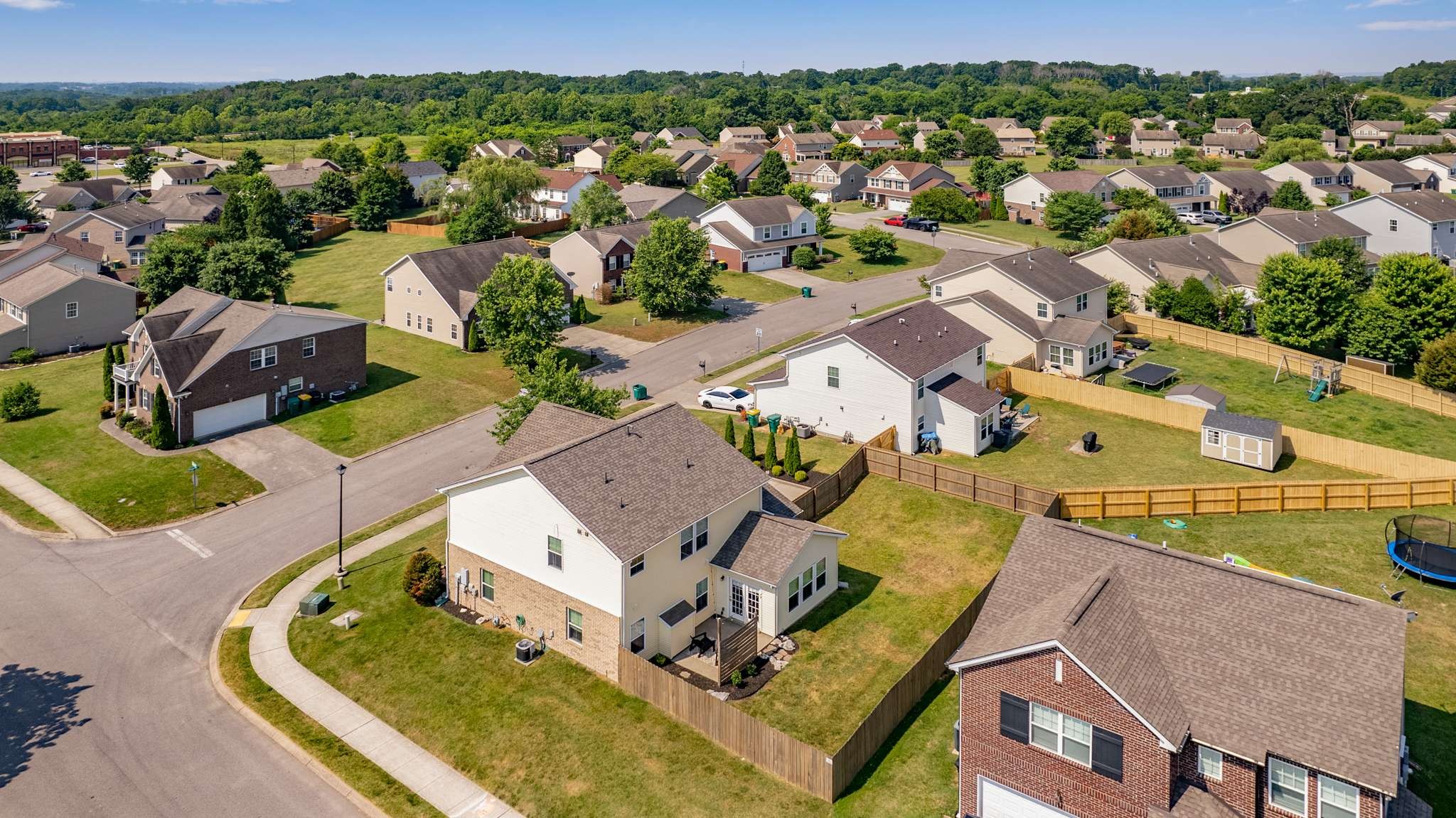 2000 Kingston Place Spring Hill, TN 37174 - Photo 49 of 56 an aerial view of residential houses with outdoor space and parking