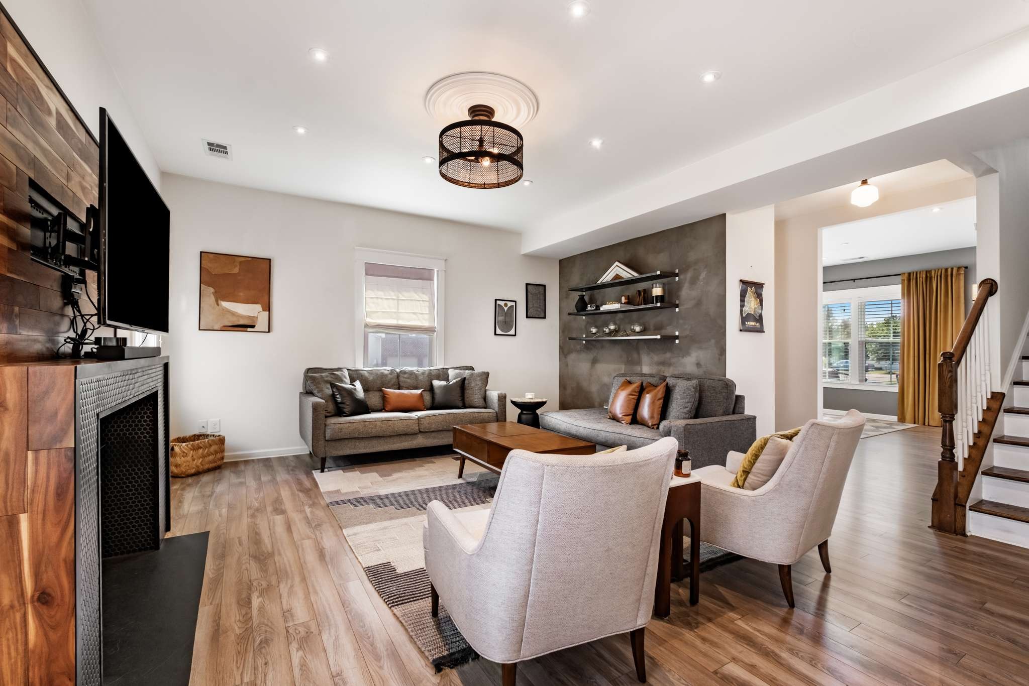 2000 Kingston Place Spring Hill, TN 37174 - Photo 7 of 56 a living room with fireplace furniture and a flat screen tv