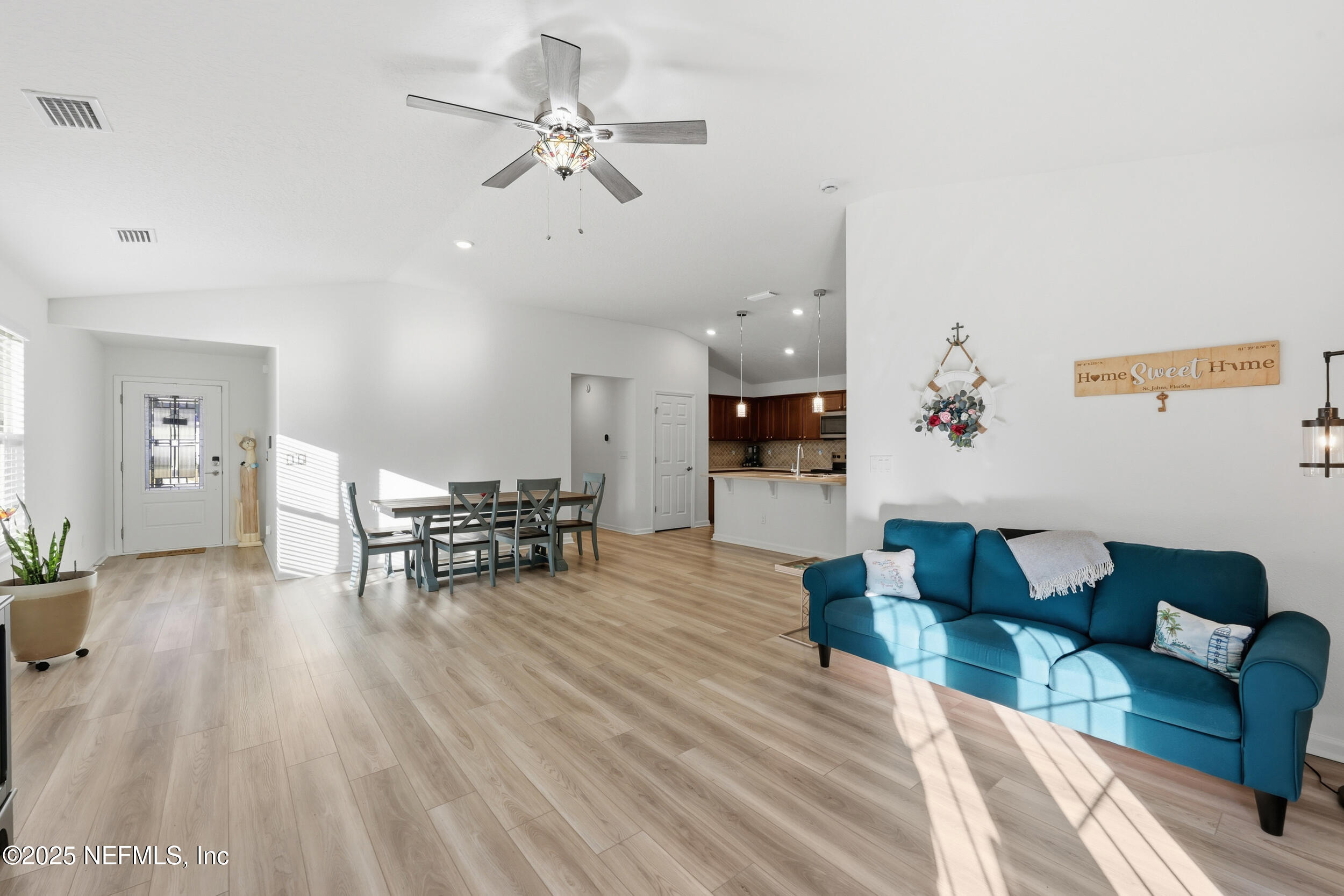 335 Boulder Lane St. Johns, FL 32259 - Photo 32 of 32 a living room with furniture and wooden floor