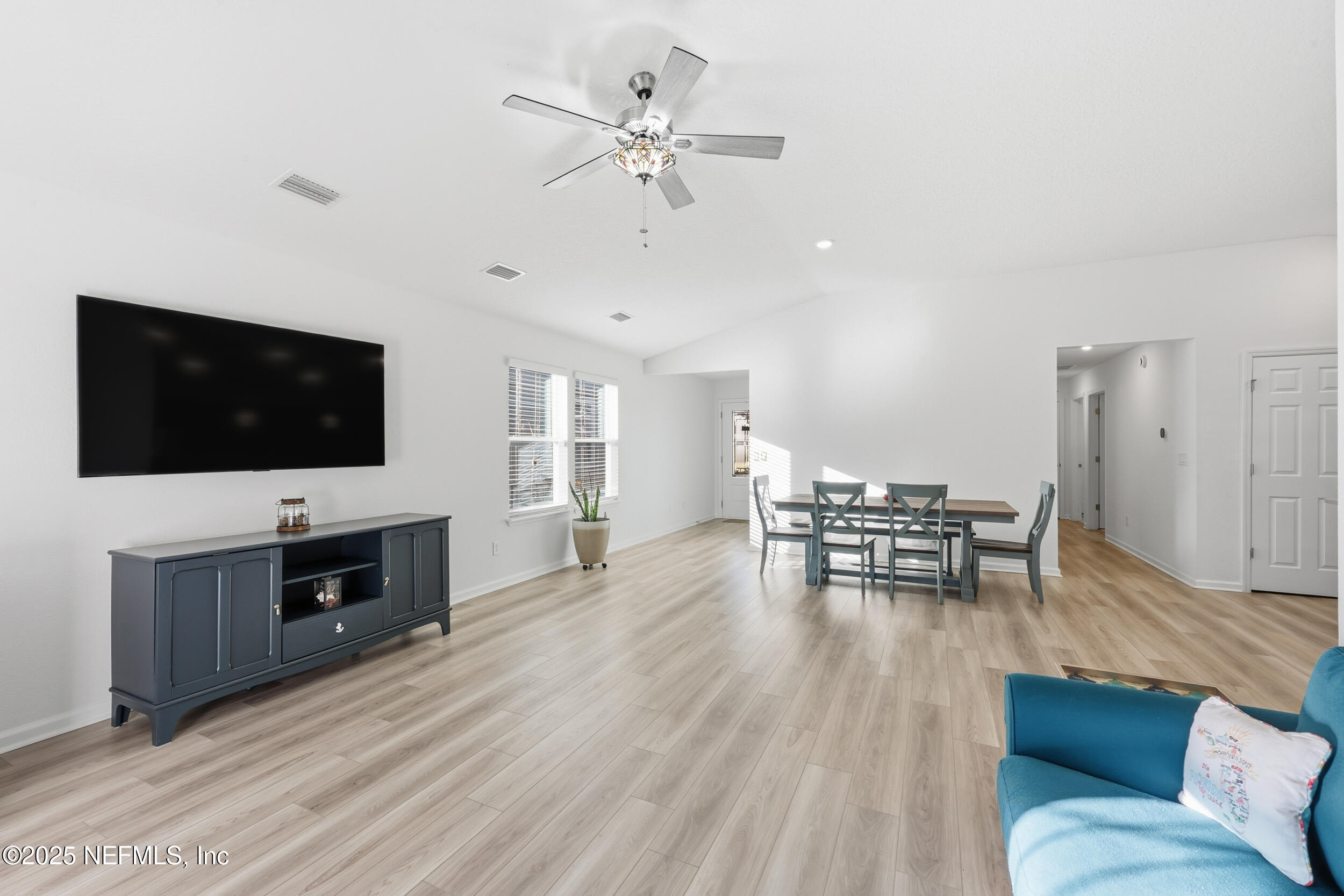 335 Boulder Lane St. Johns, FL 32259 - Photo 13 of 32 a living room with furniture and a flat screen tv