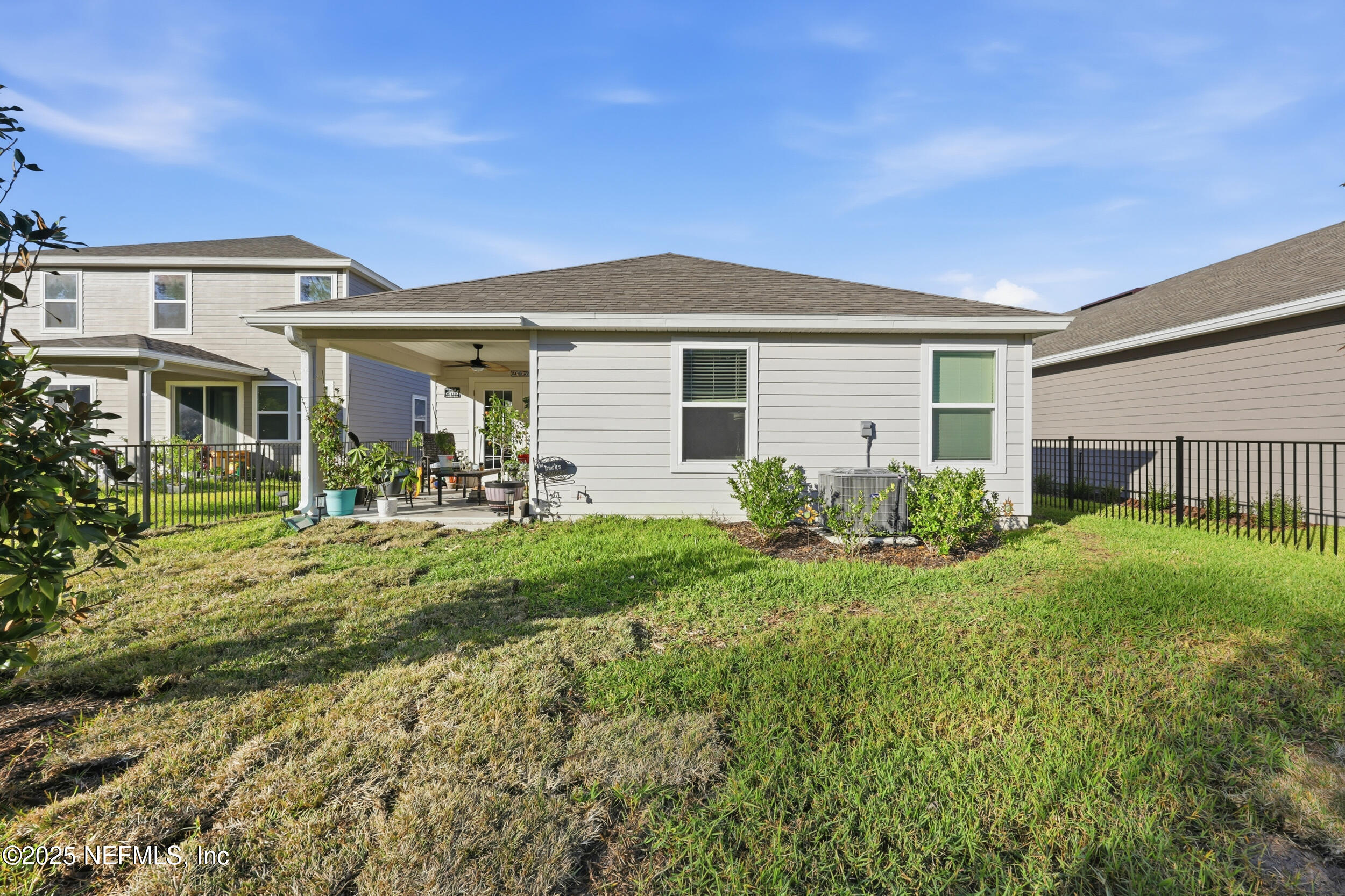 335 Boulder Lane St. Johns, FL 32259 - Photo 21 of 32 a front view of a house with garden