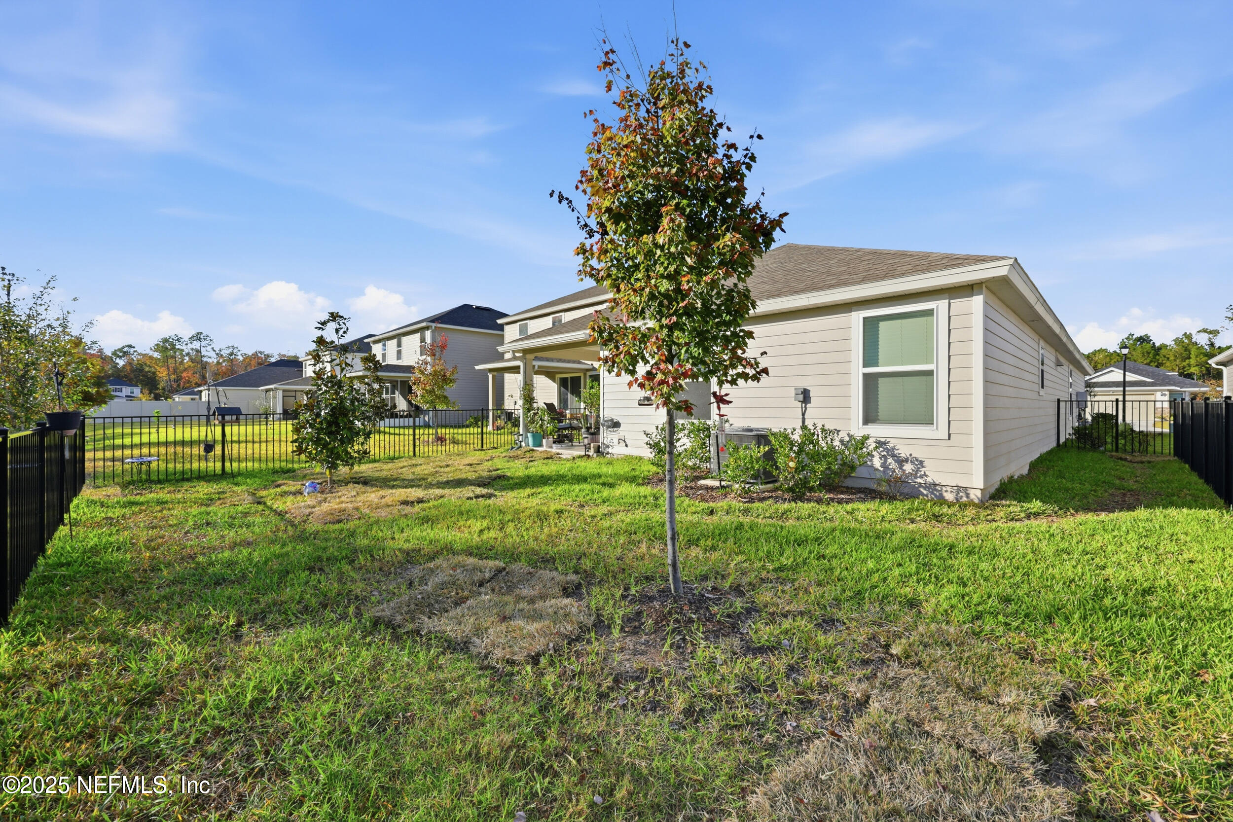 335 Boulder Lane St. Johns, FL 32259 - Photo 22 of 32 a front view of a house with a yard