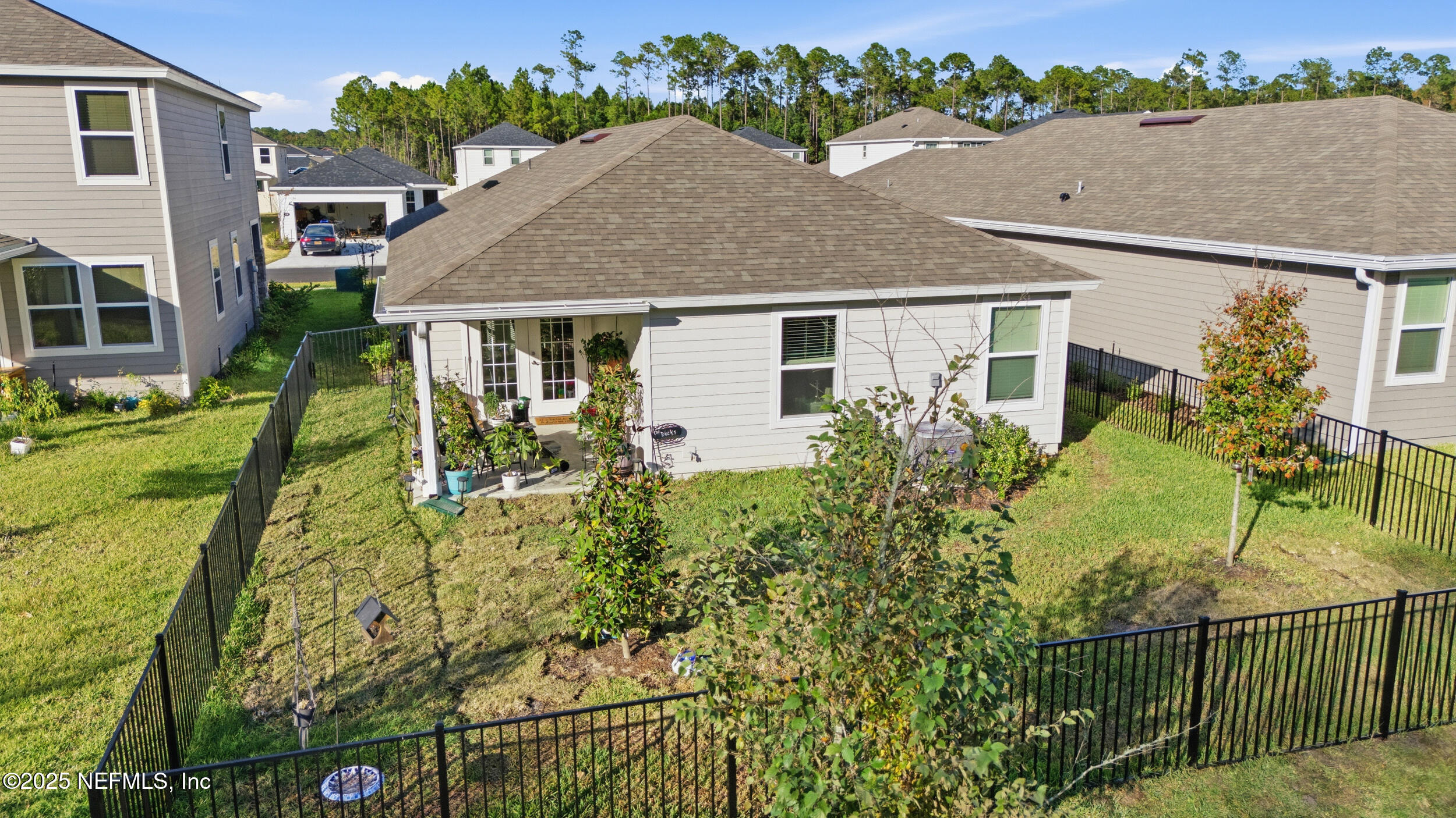335 Boulder Lane St. Johns, FL 32259 - Photo 26 of 32 front view of house with a yard