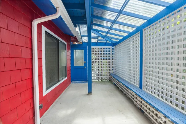 a view of a house with a yard and garage