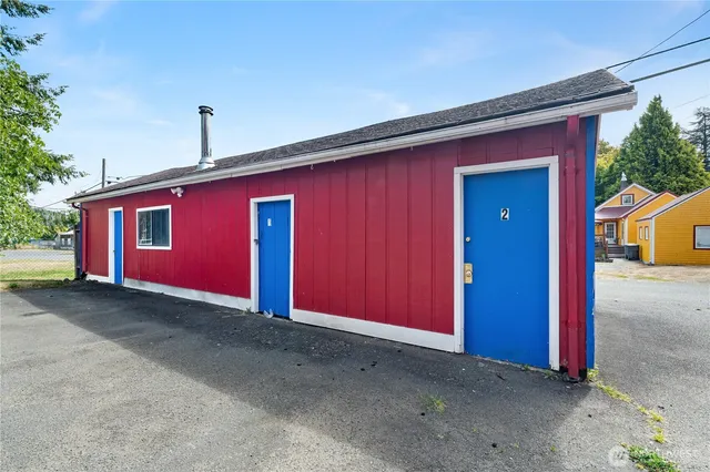 an aerial view of houses with outdoor space