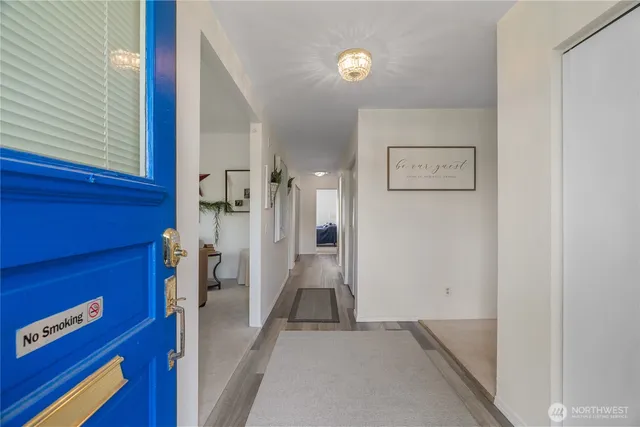 a view of an entryway with a workspace