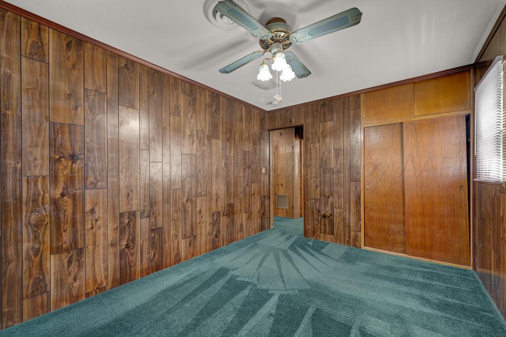 5025 South Crockett Street Amarillo, TX 79110 - Photo 20 of 30 a view of a livingroom with a ceiling fan