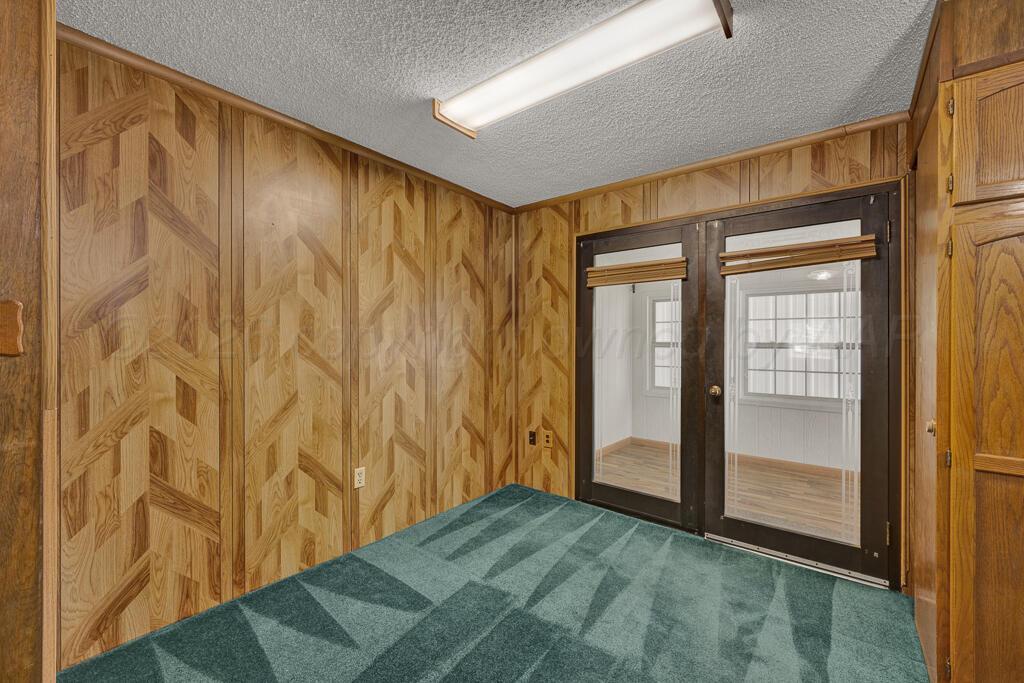 5025 South Crockett Street Amarillo, TX 79110 - Photo 5 of 30 a view of entryway with wooden floor